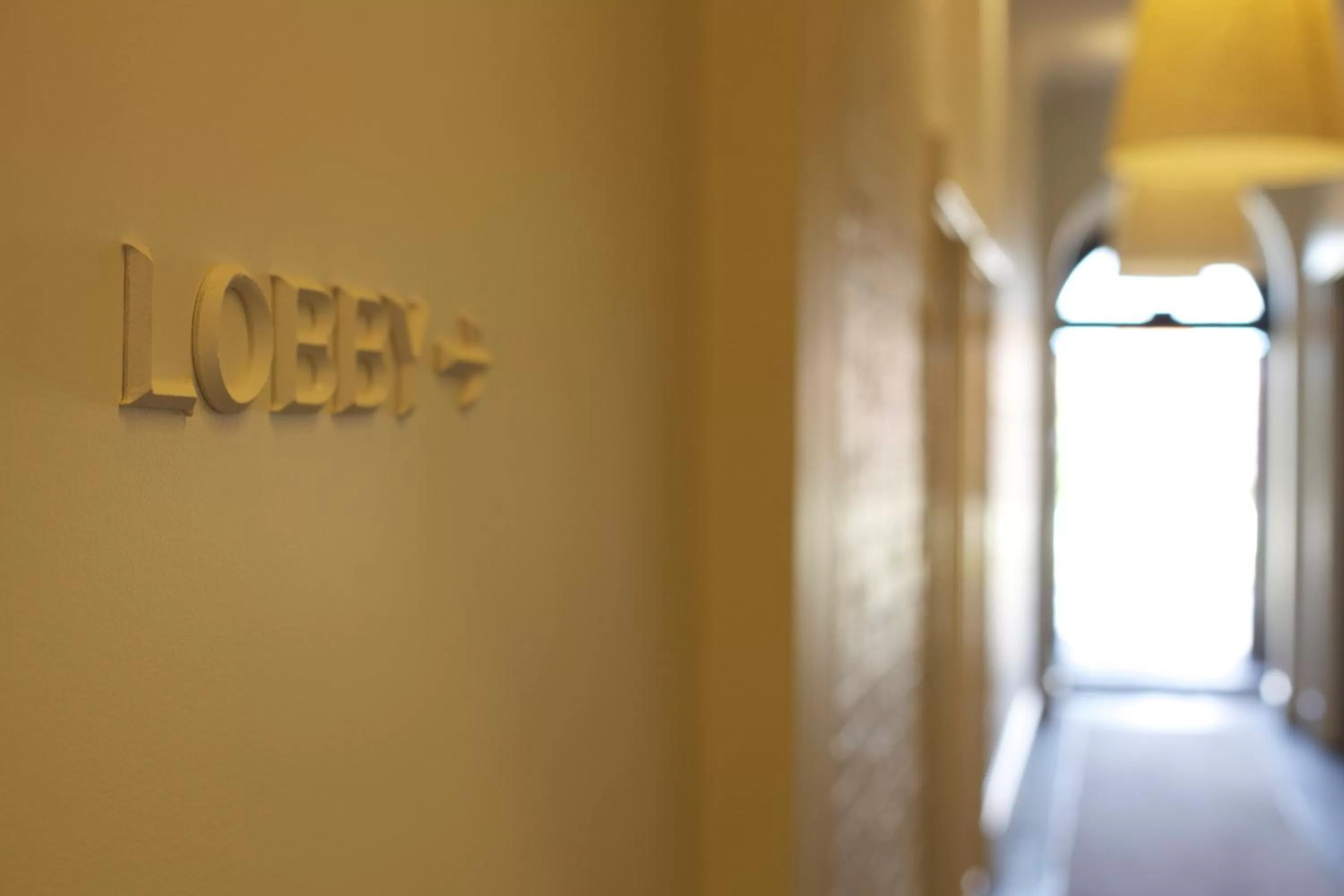 Property logo or sign in Perry Street Boutique Hotel