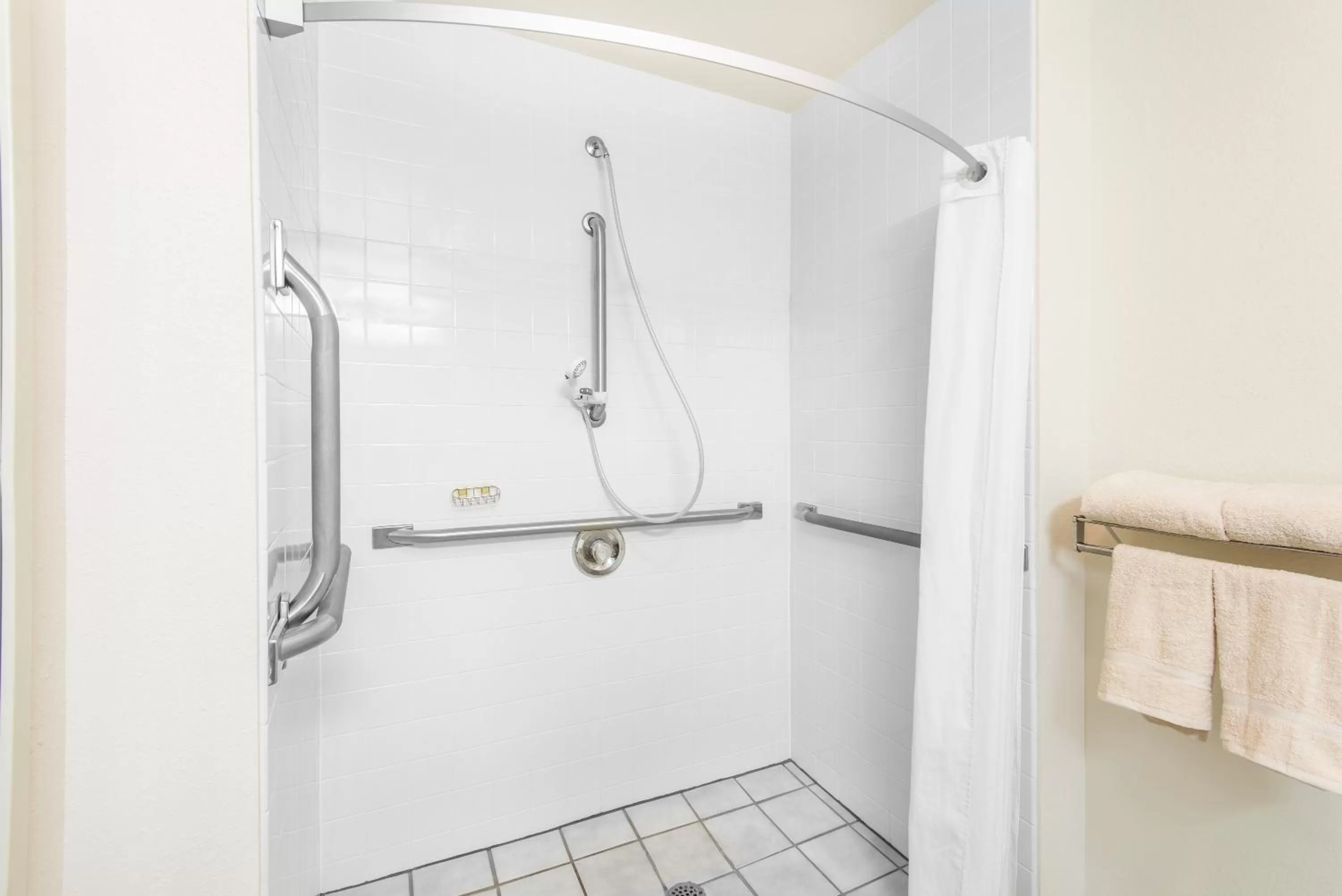Bathroom in Super 8 by Wyndham West Middlesex/Sharon Area