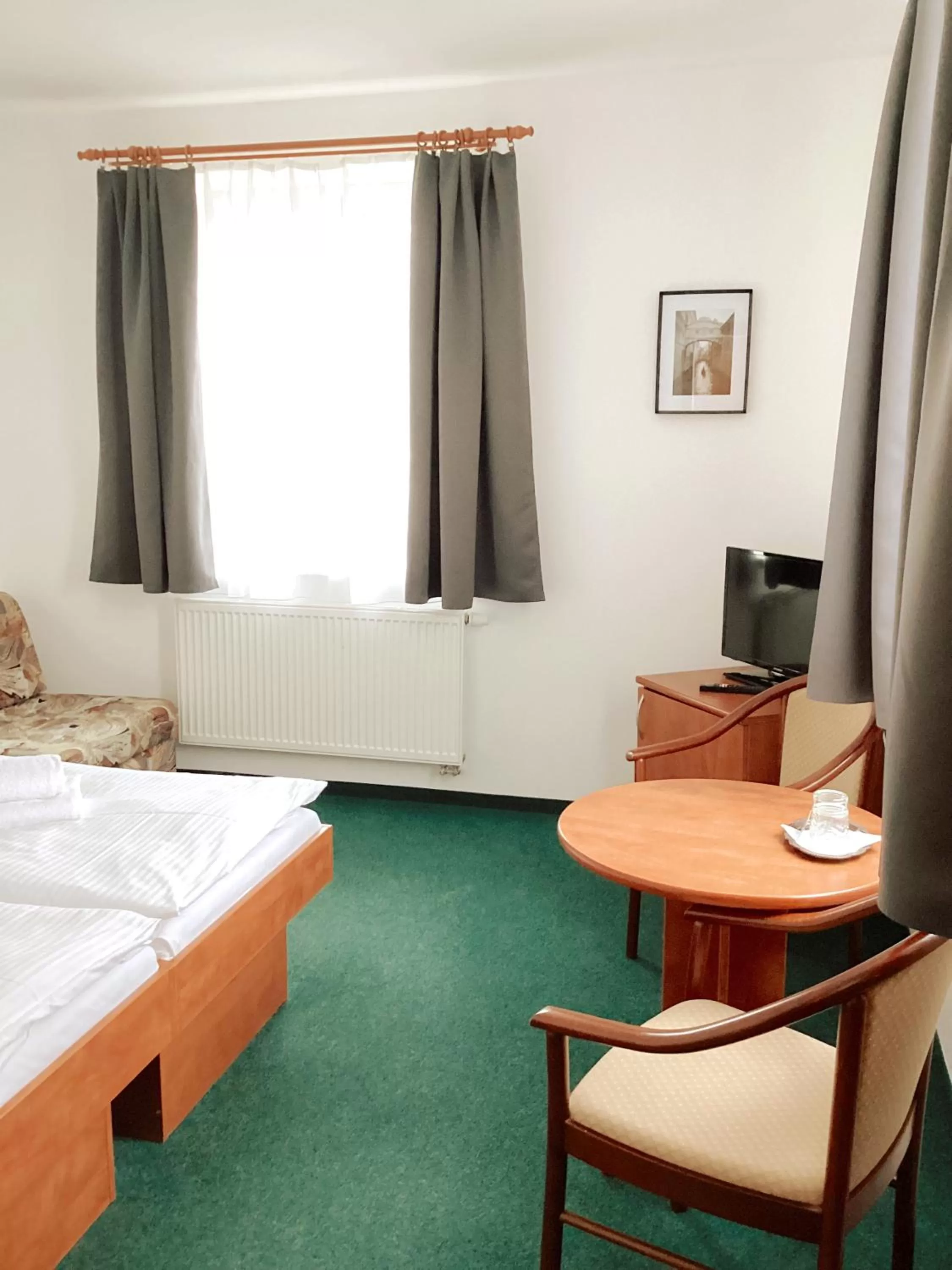 Bed in Hotel Karolina