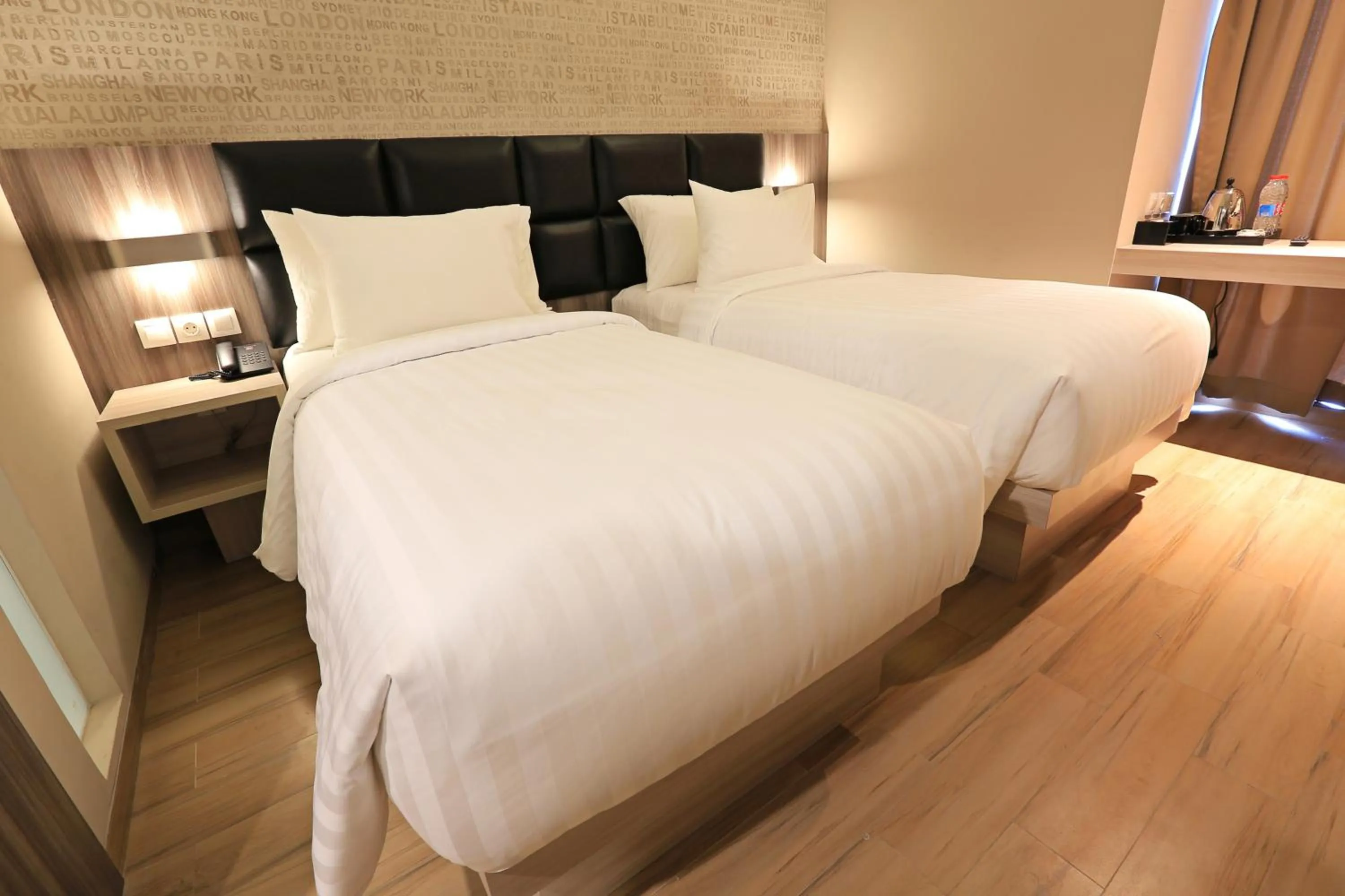 Bed in Luminor Hotel Jambi Kebun Jeruk By WH