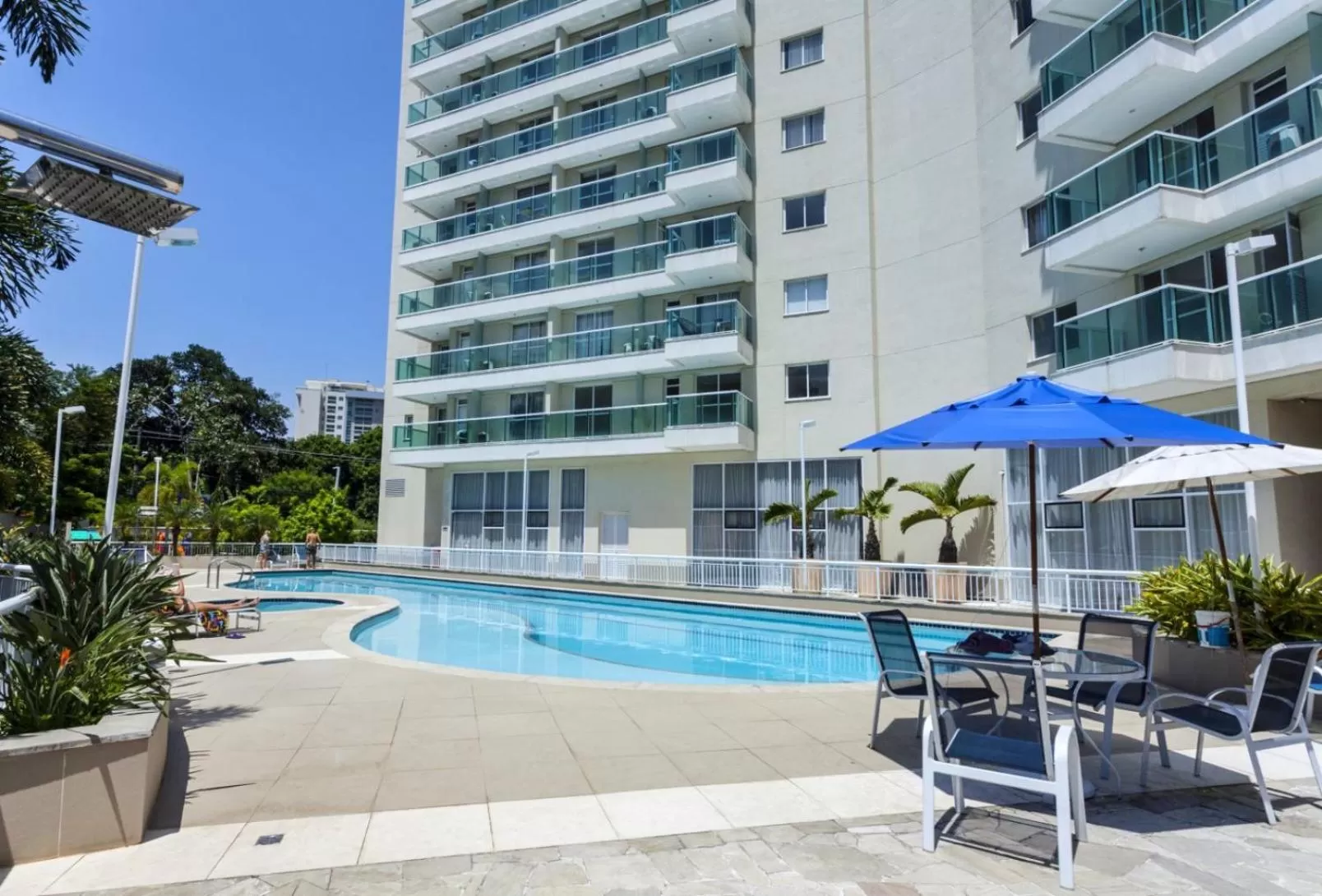Property building, Swimming Pool in Suíte & Flat Premium Rio Stay - Rio Centro