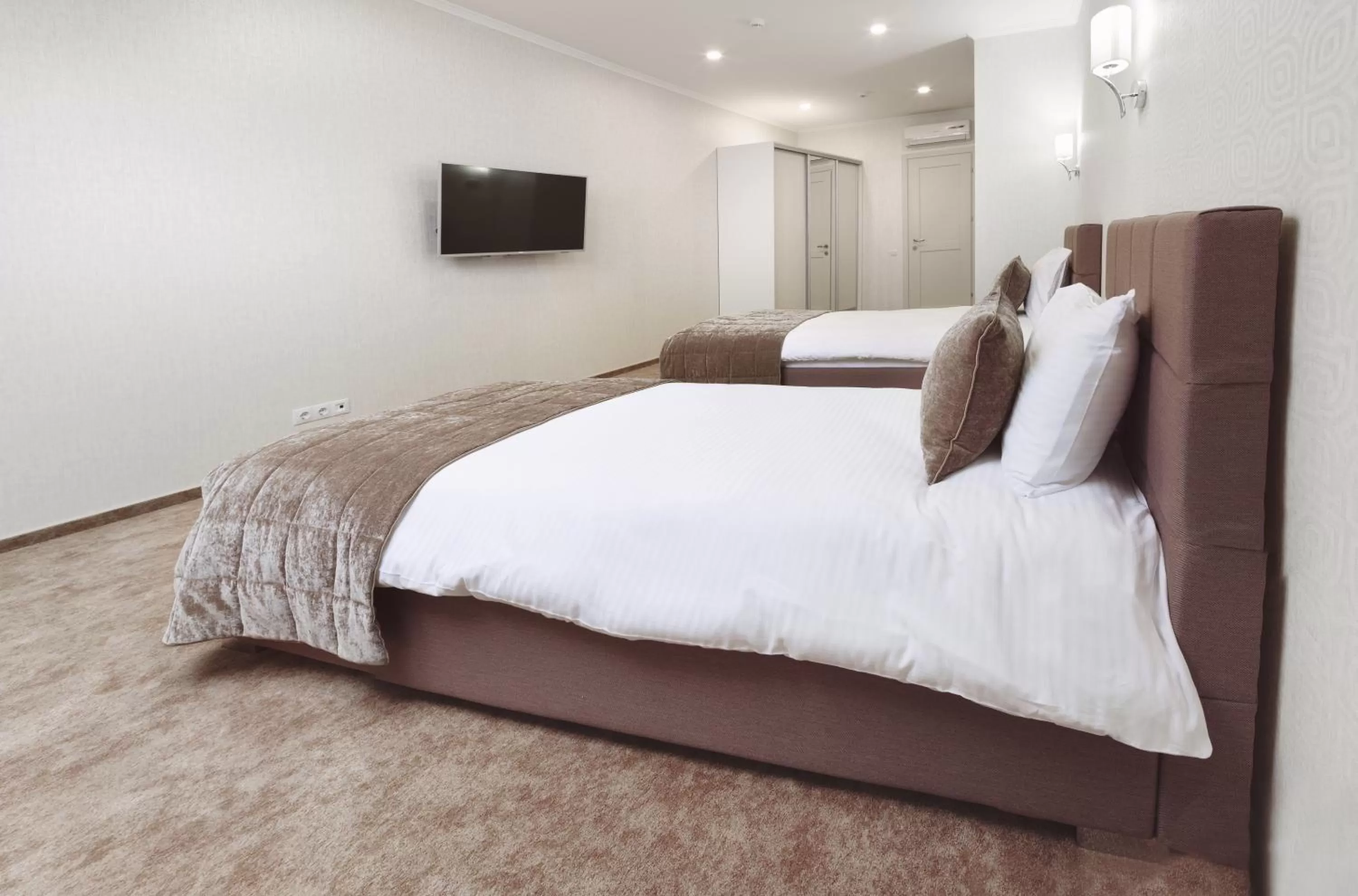 Bed in Familion ApartHotel