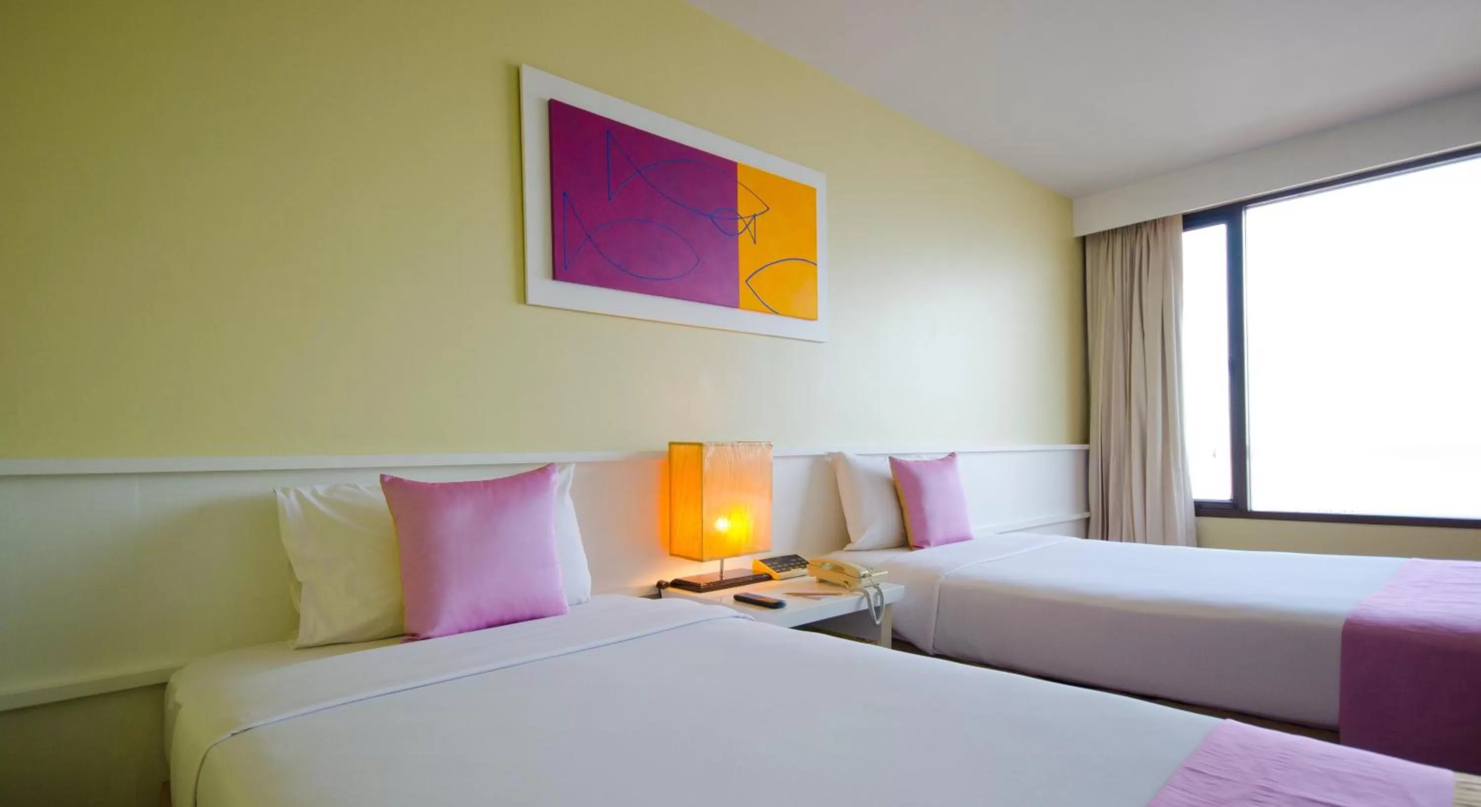 Bed in Tongtara Riverview Hotel