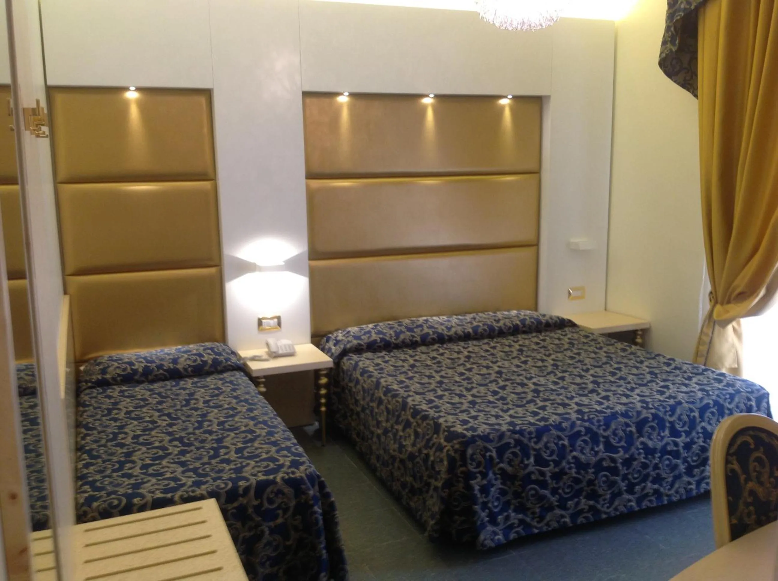 Bed in Hotel Ambassador