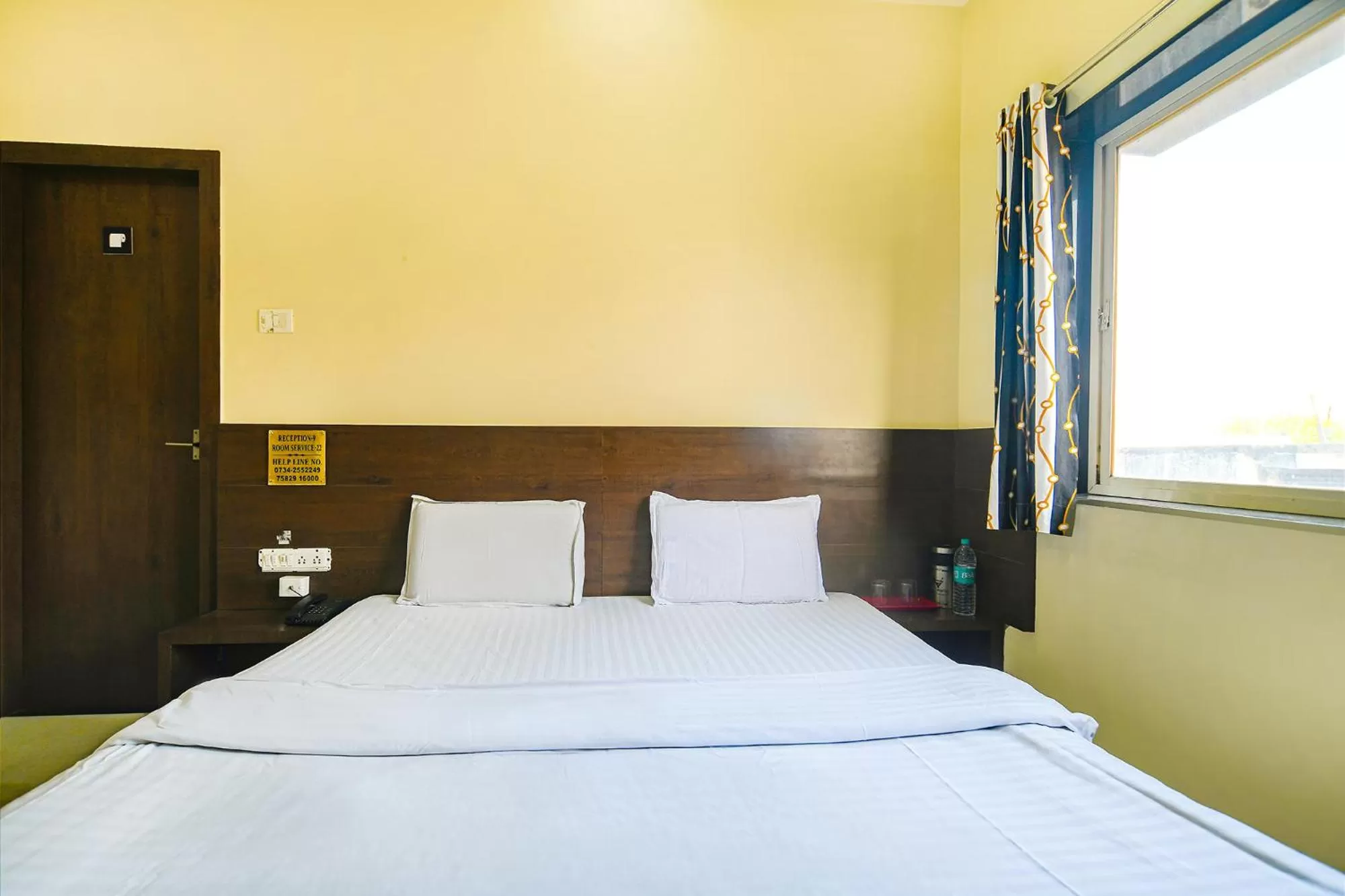 Bed in FabHotel Satyug Jaisinghpura