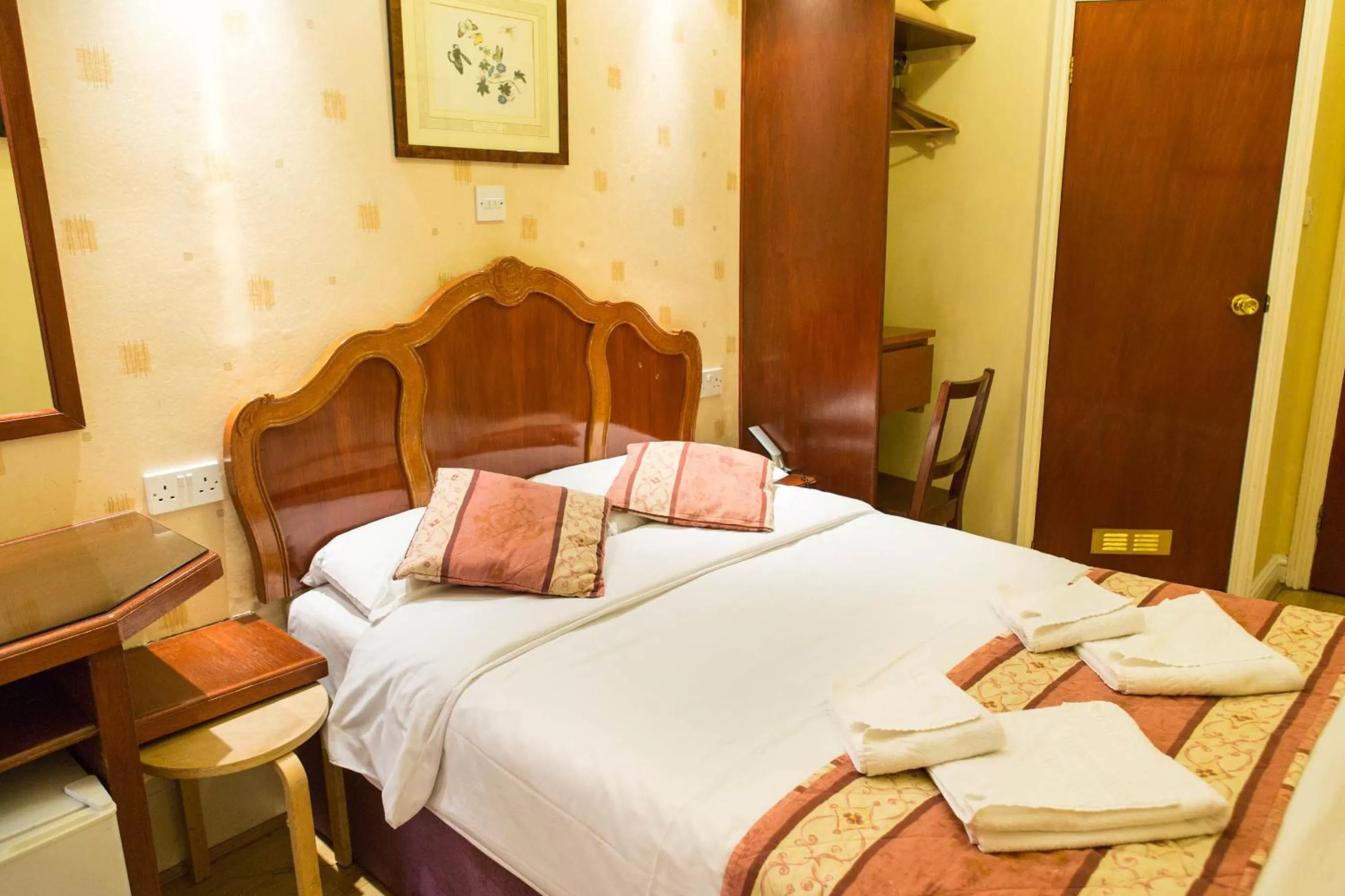 Bed in Dolphin Hotel