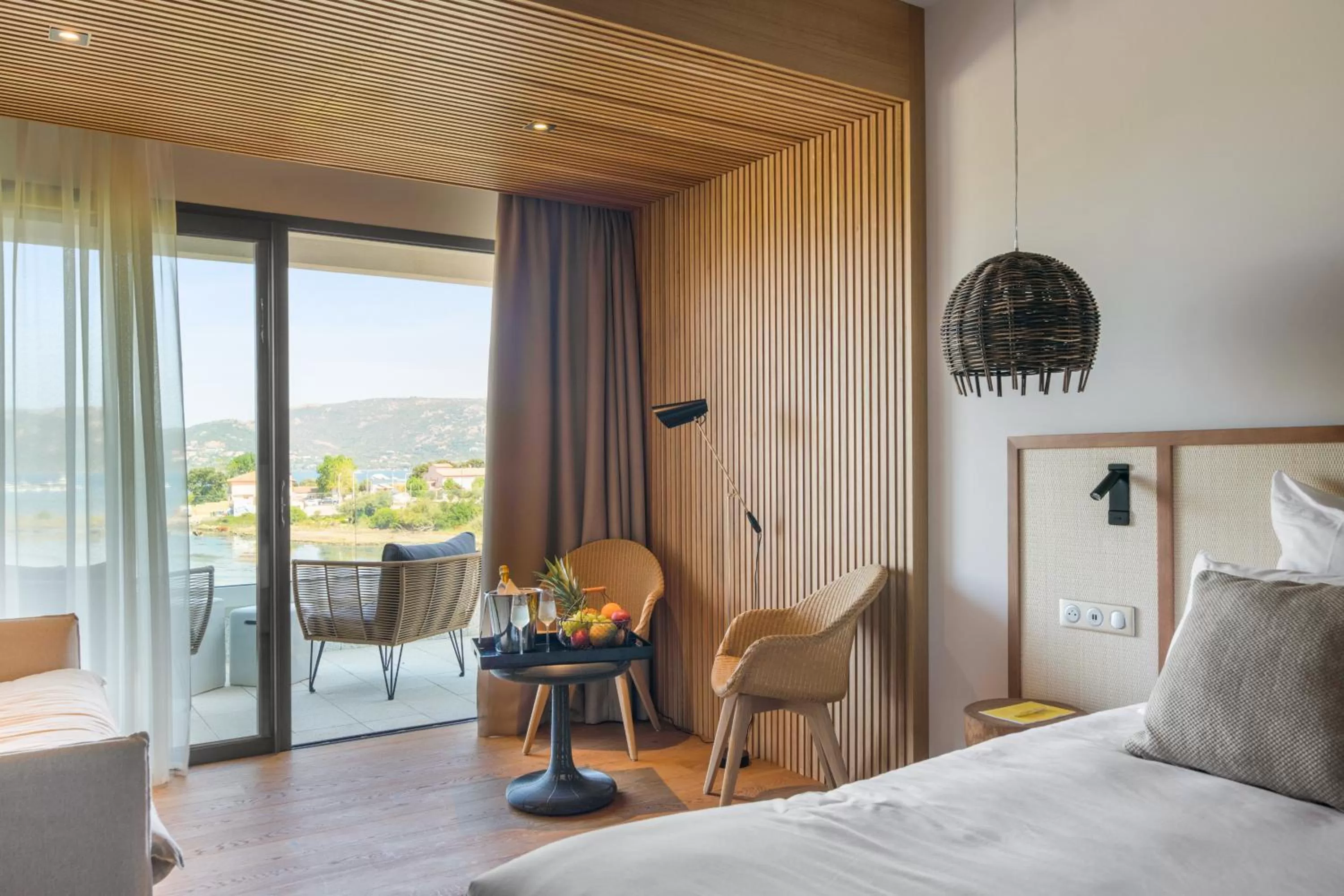 Photo of the whole room, Bed in Golden Tulip Porto-Vecchio