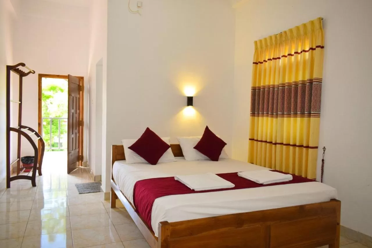 Bed in Hotel Theevanni Inn