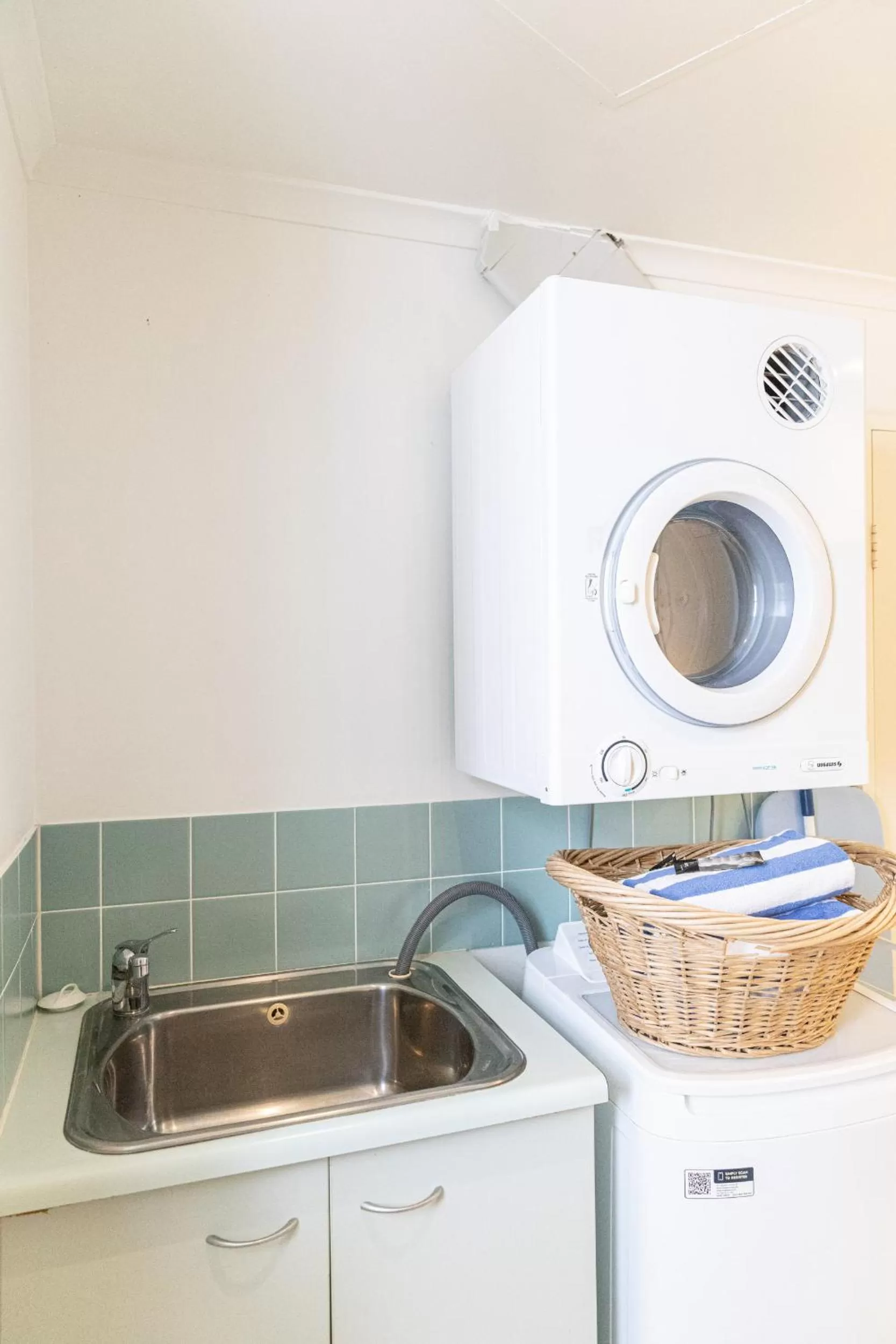 laundry in Beaches Holiday Apartments - Official Onsite Reception & Check In