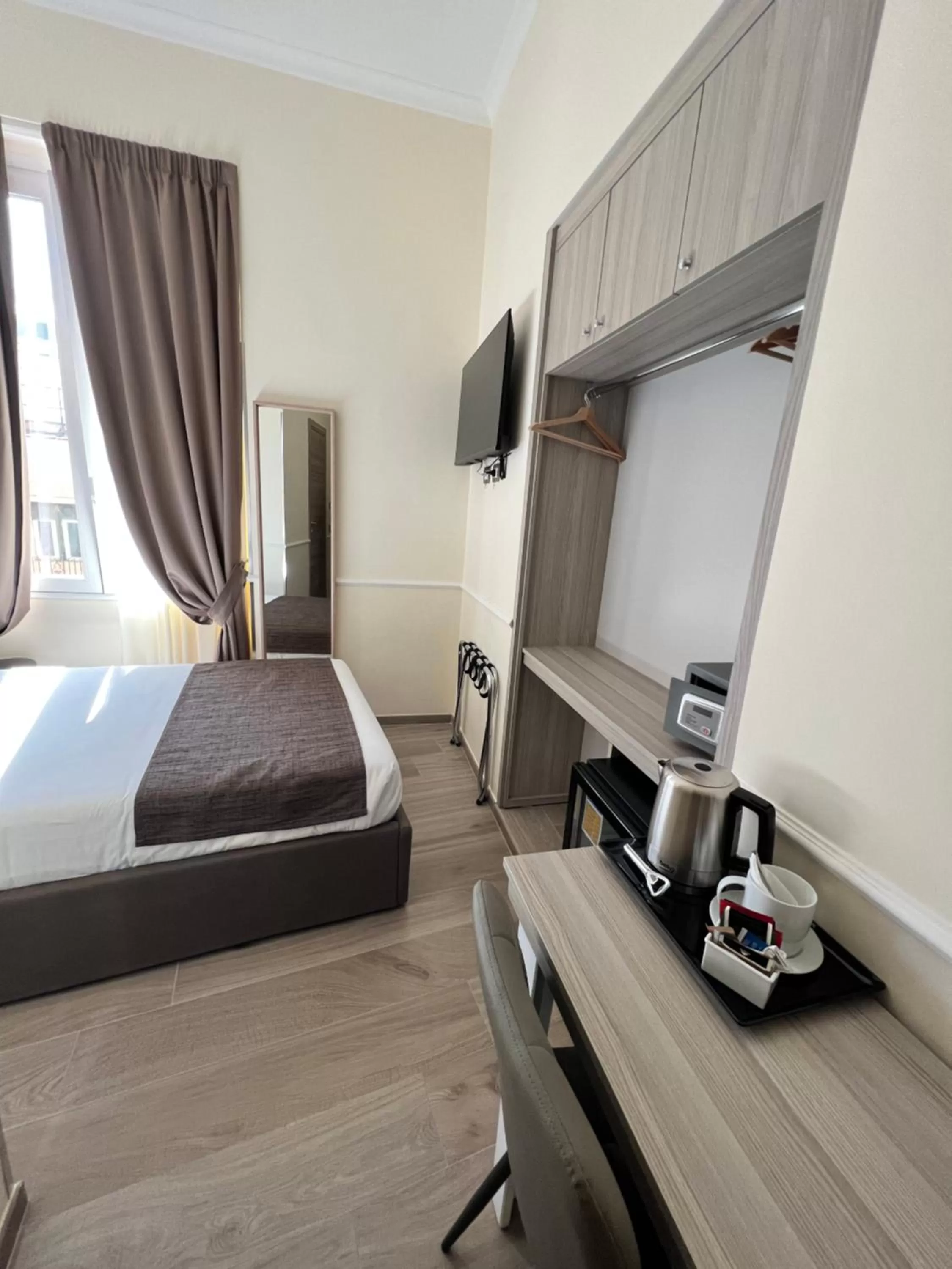 Bed in Hotel Le Petit