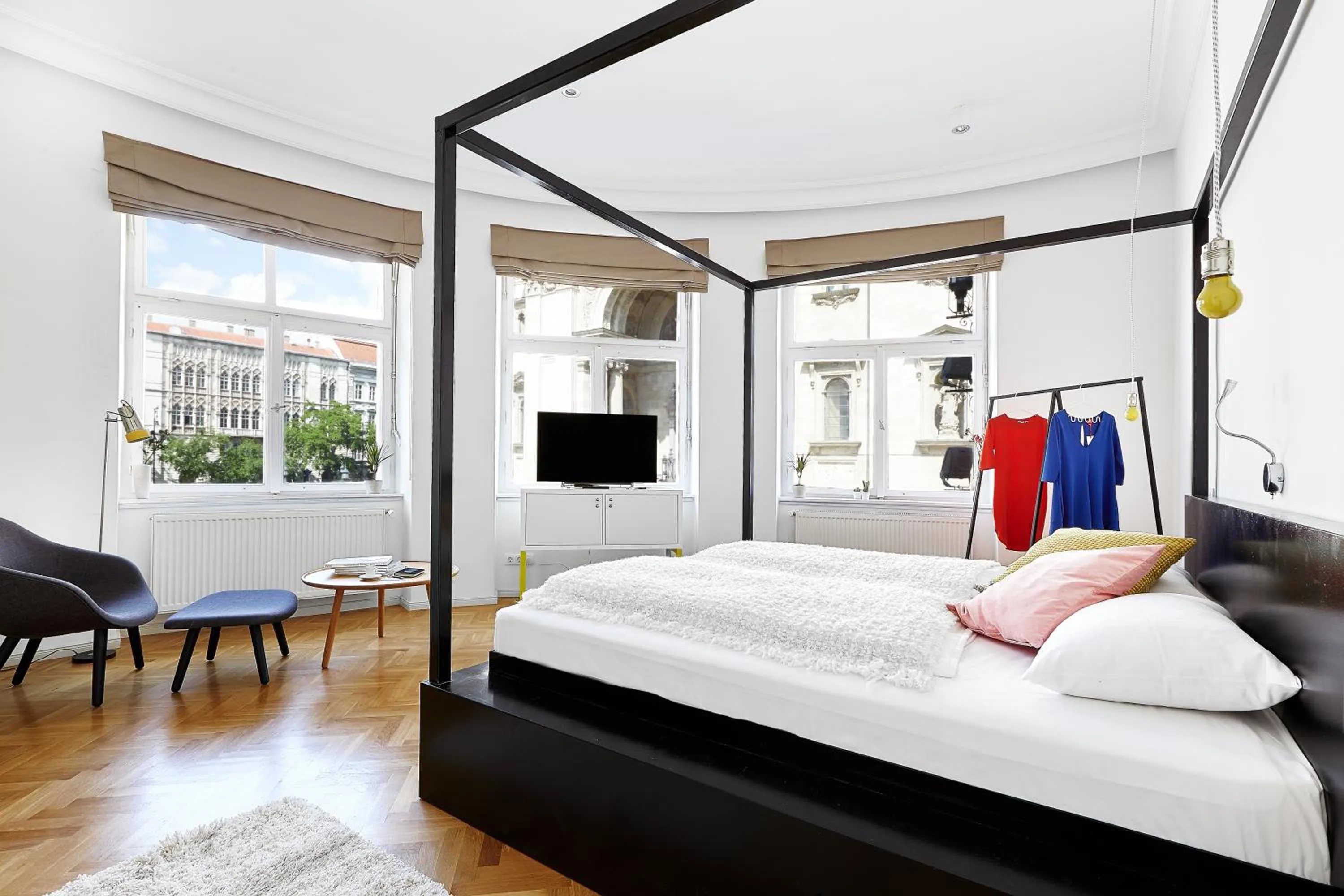 Bed in MGZN Basilica Rooms