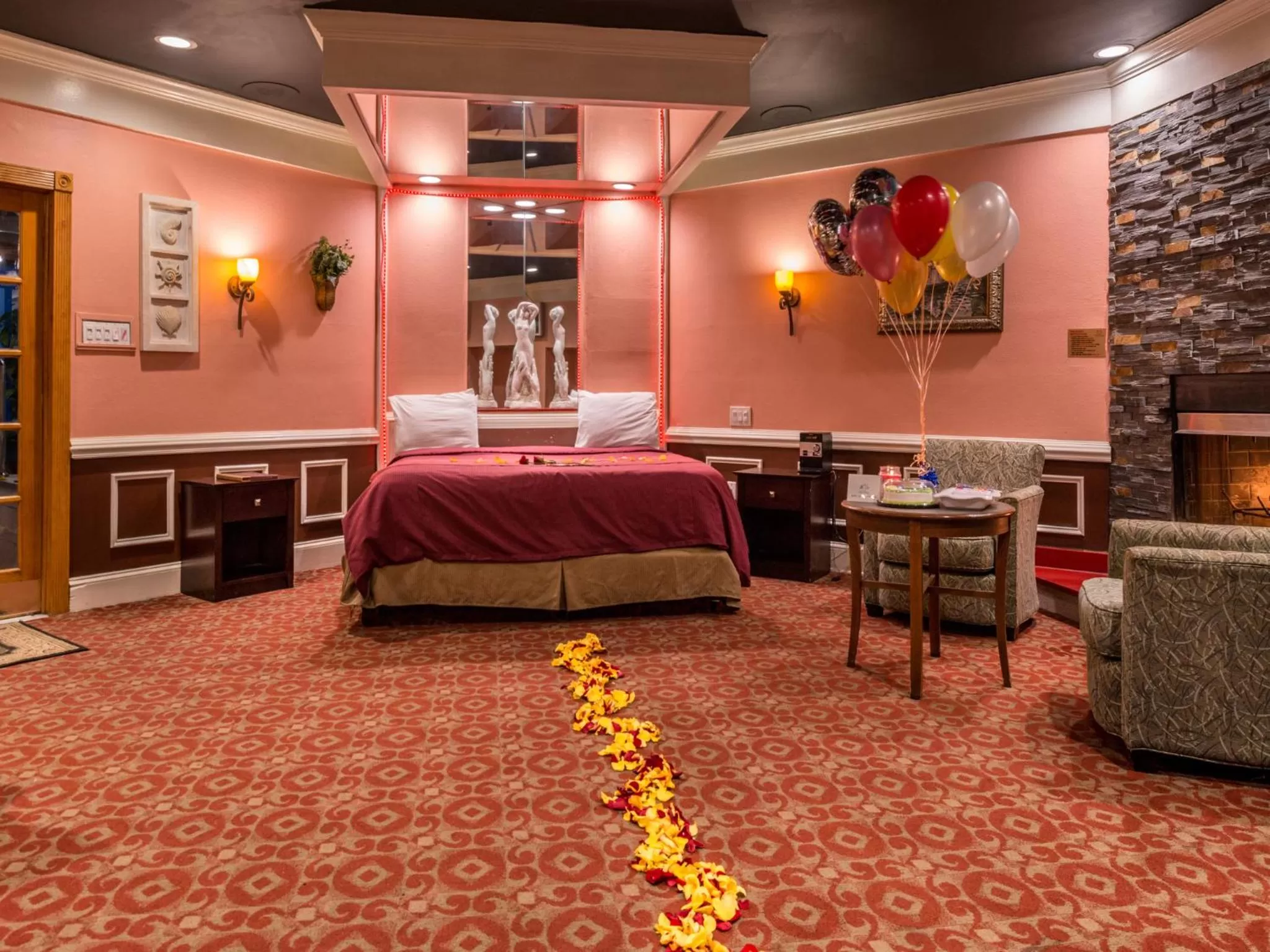 Bed in Inn of The Dove Romantic Luxury & Business Suites