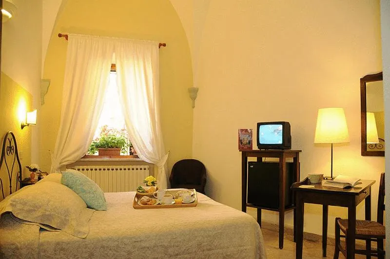 Bed in Albergo Duomo