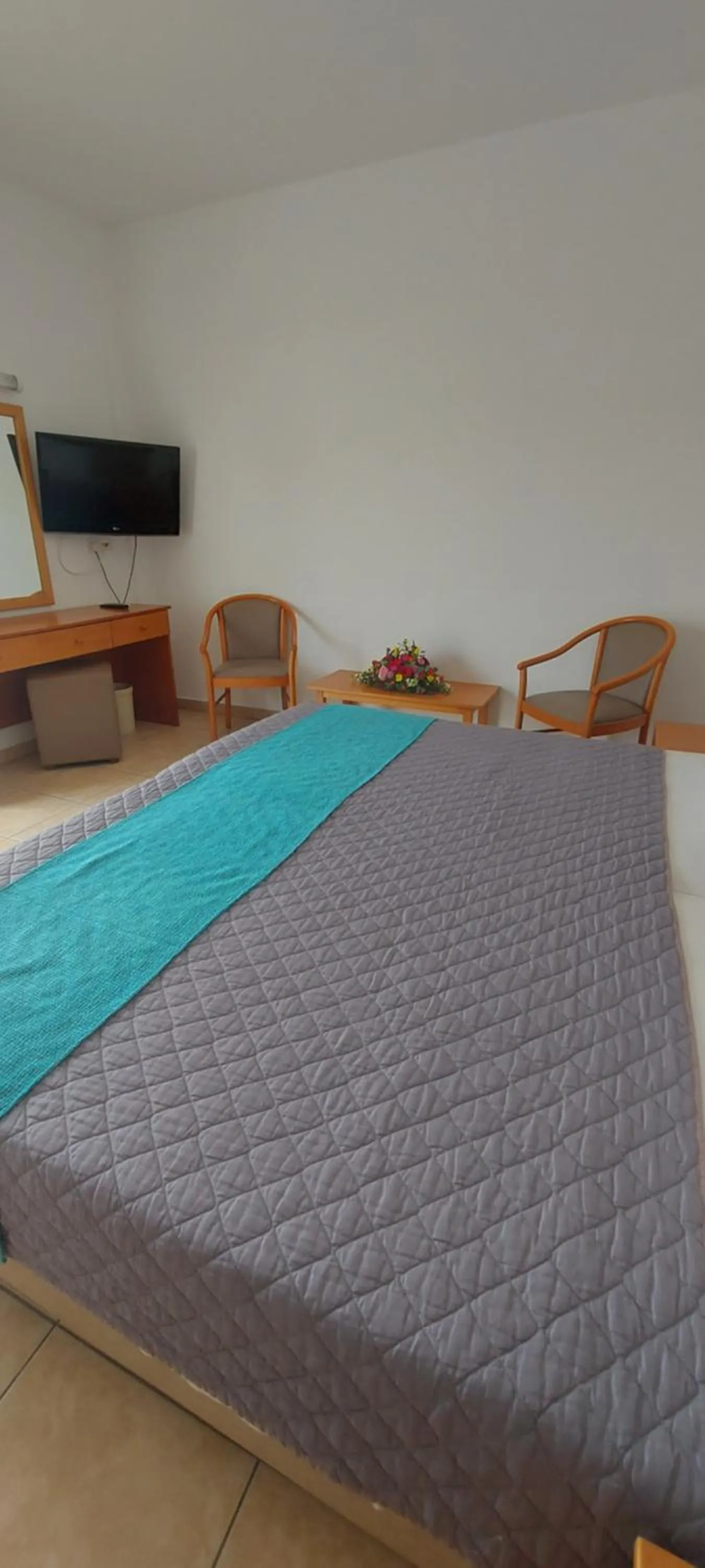 Bed in New Famagusta Hotel & Suites