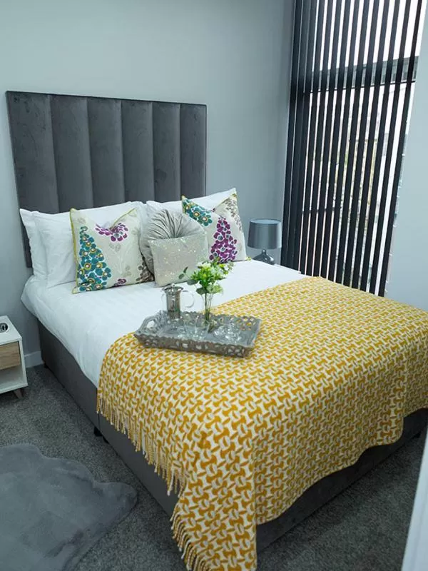 Bed in Spire Accommodations Ltd