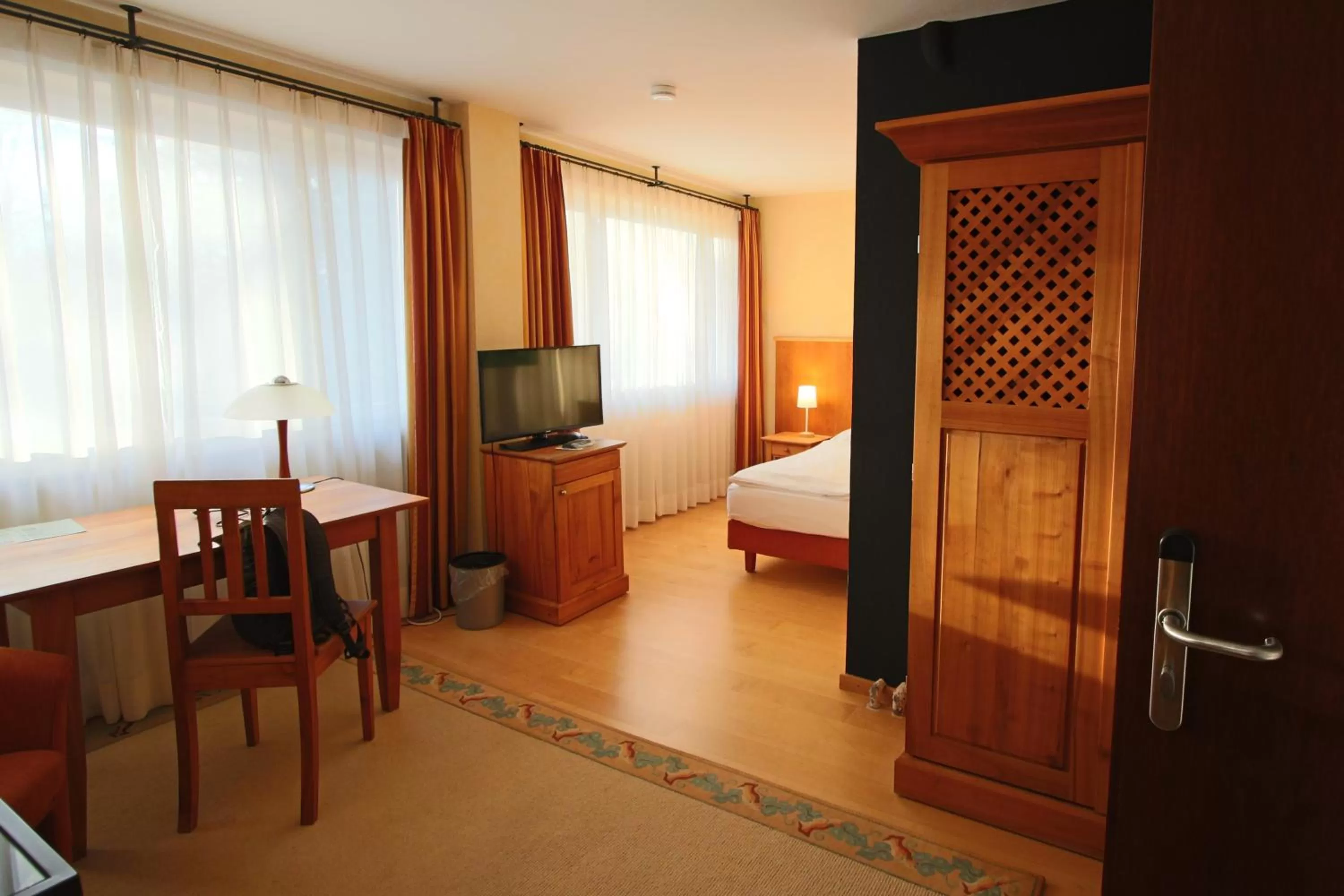 Living room, Bed in Hardtwald Hotel