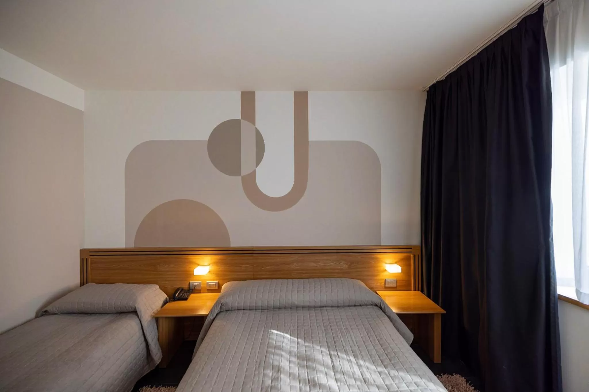 Bed in Hotel Europa Belluno