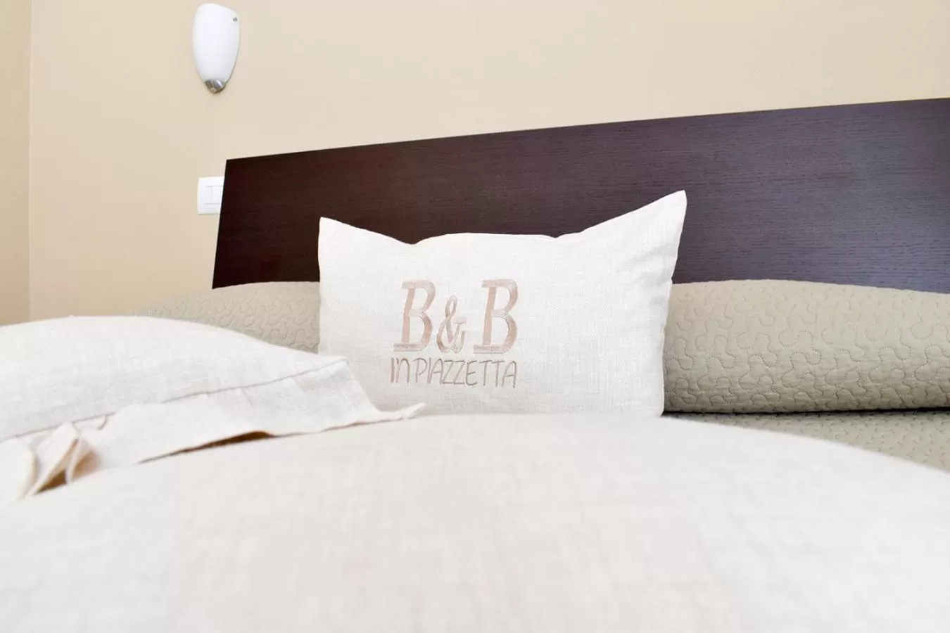 Property logo or sign, Bed in Affittacamere in Piazzetta
