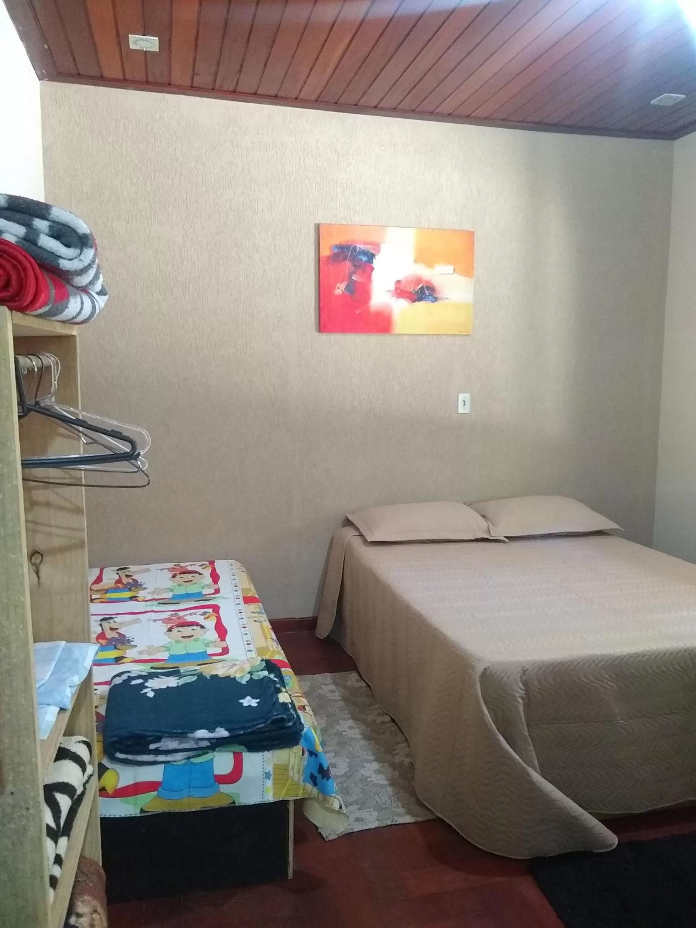 Bed in Pousada do Ribeirão