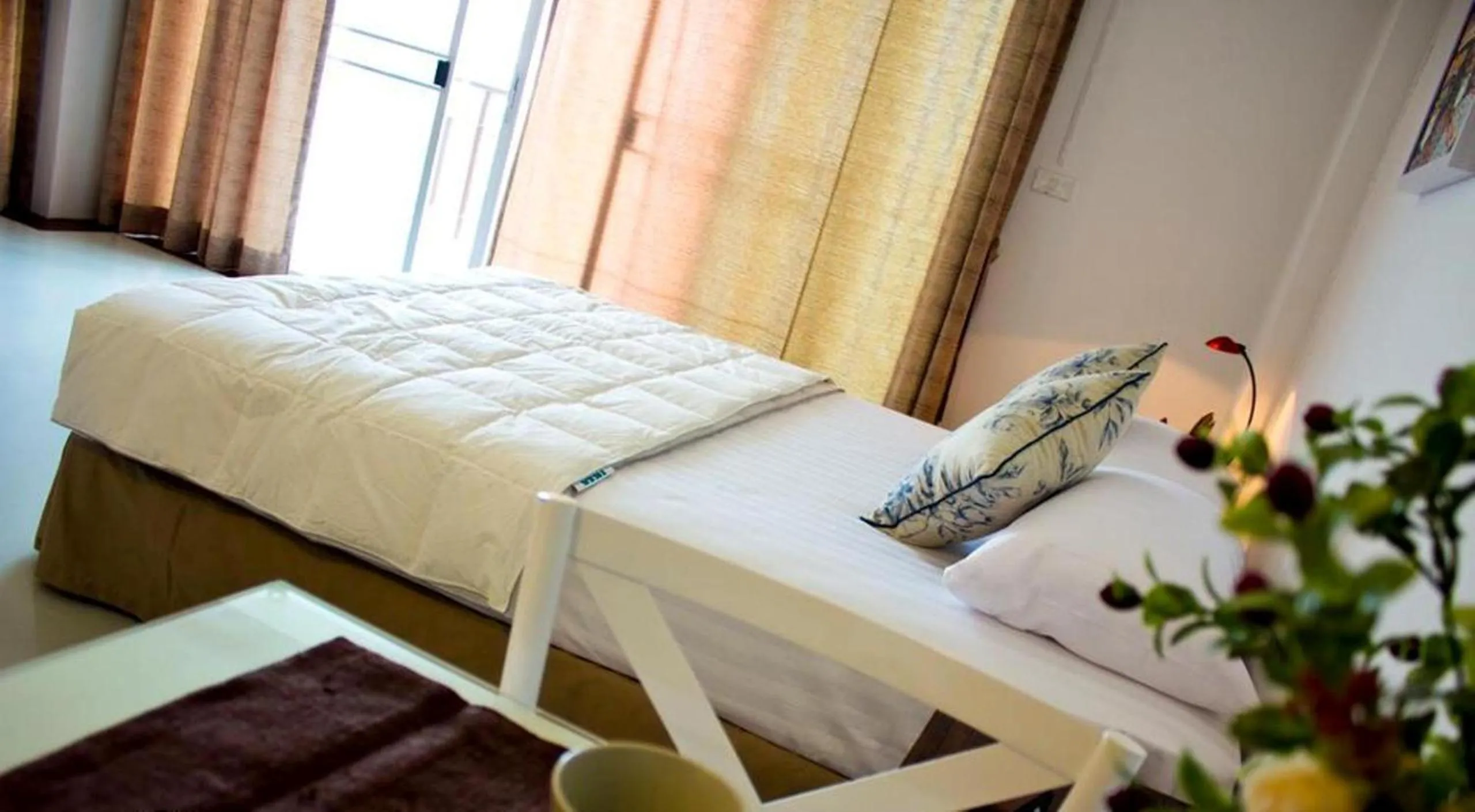 Bed in The Meet Green Apartment