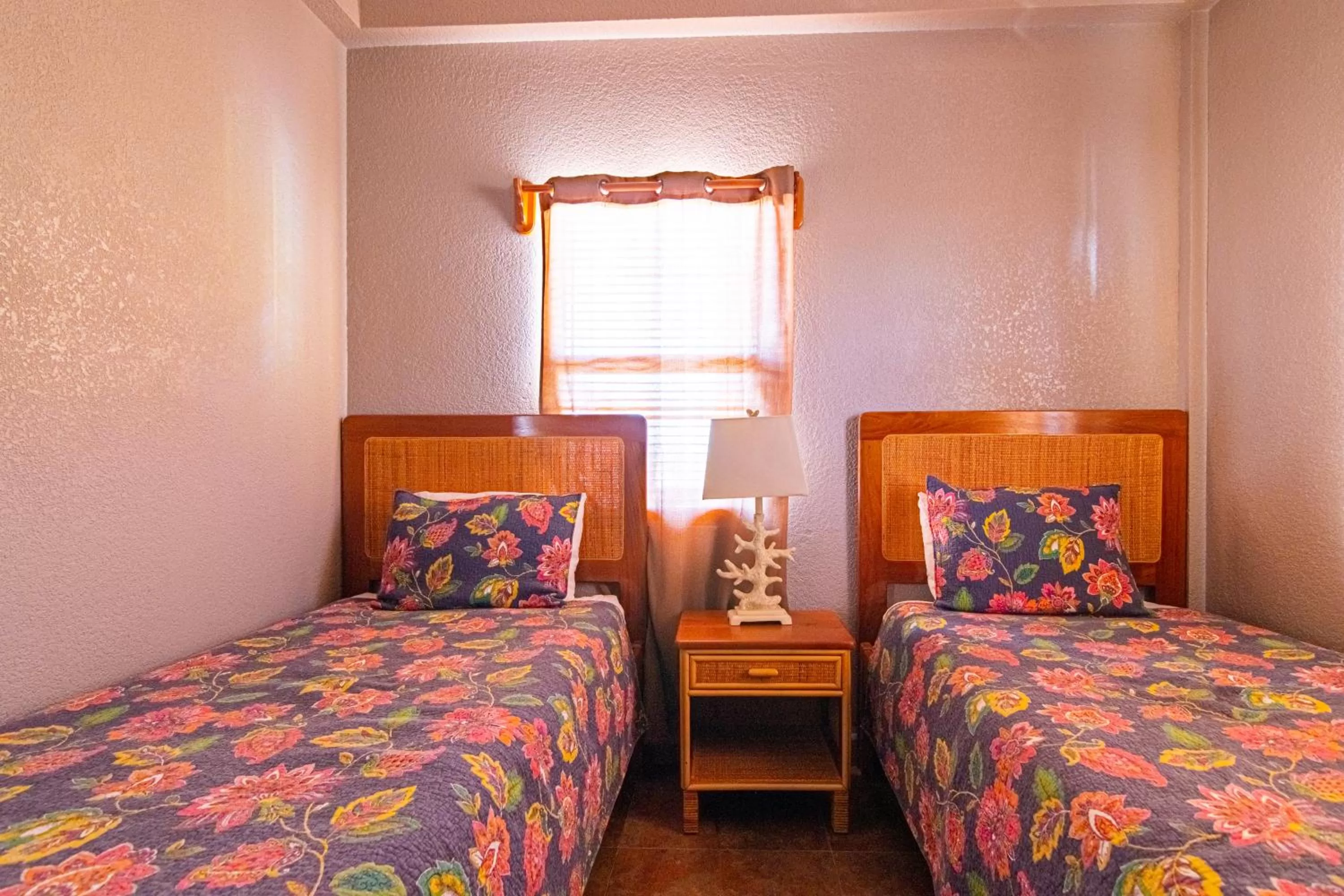 Bed in Lighthouse Beach Villas