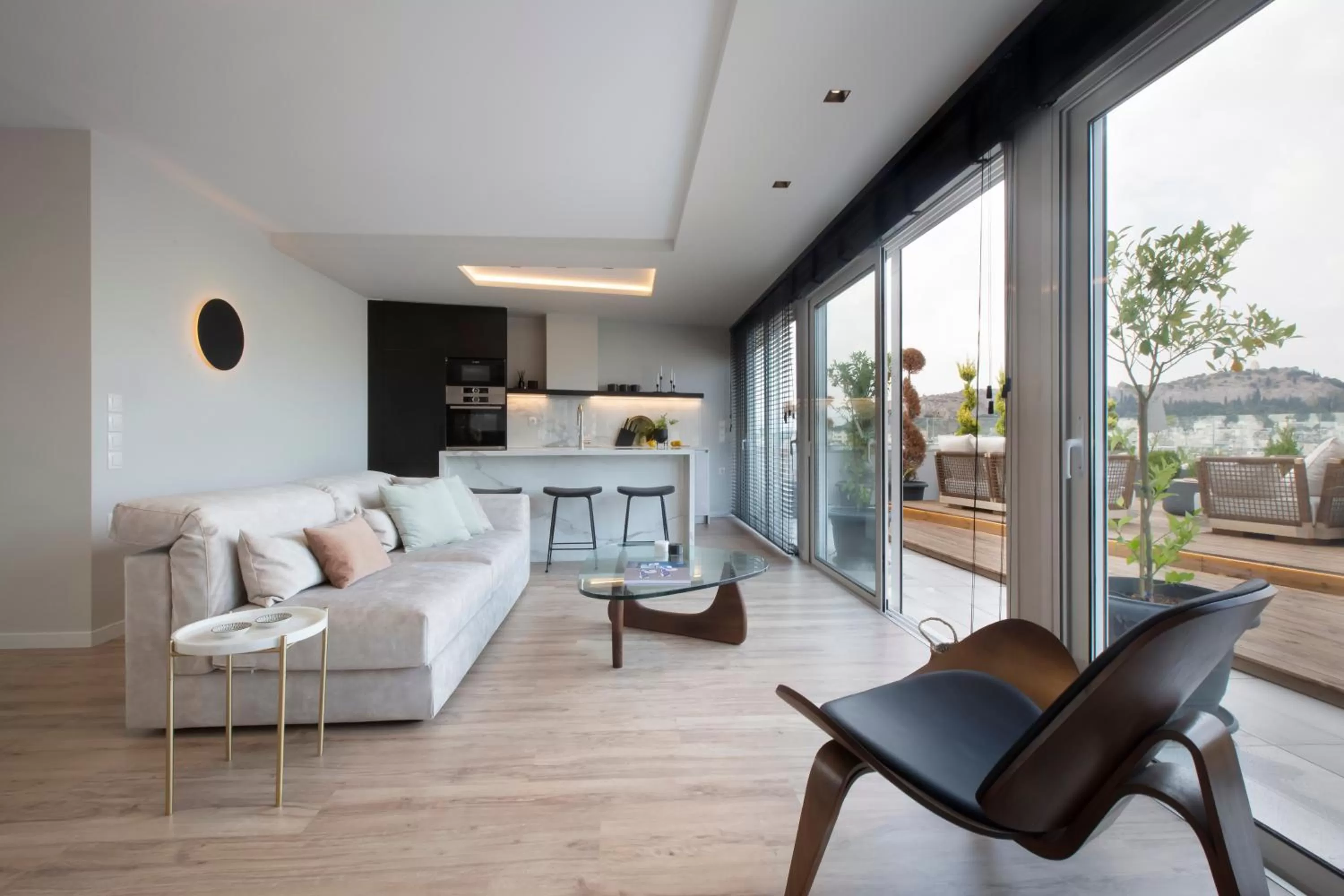 Living room in Supreme Luxury Suites by Athens Stay