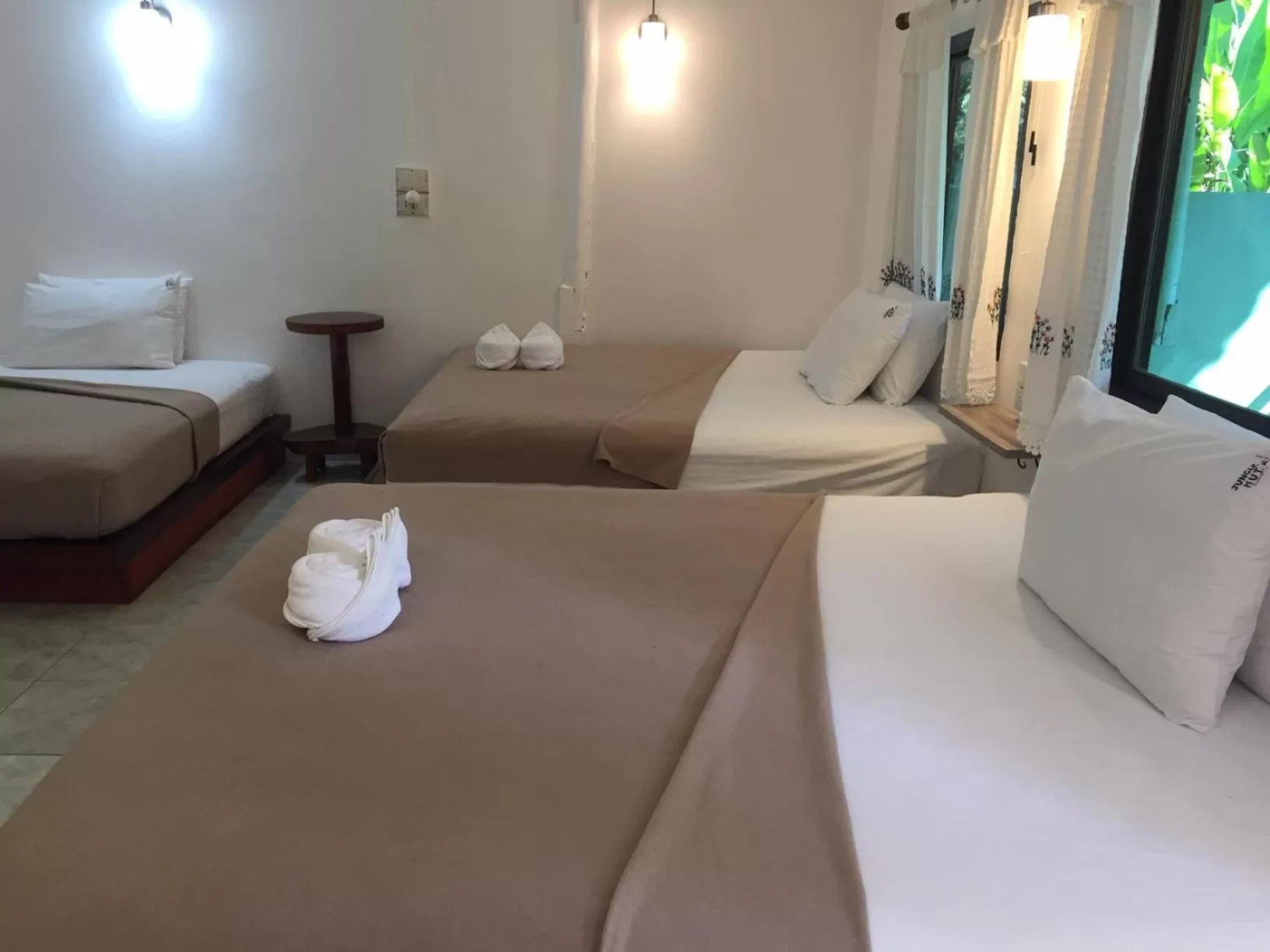 Photo of the whole room, Bed in Khao Sok Jungle Huts Resort