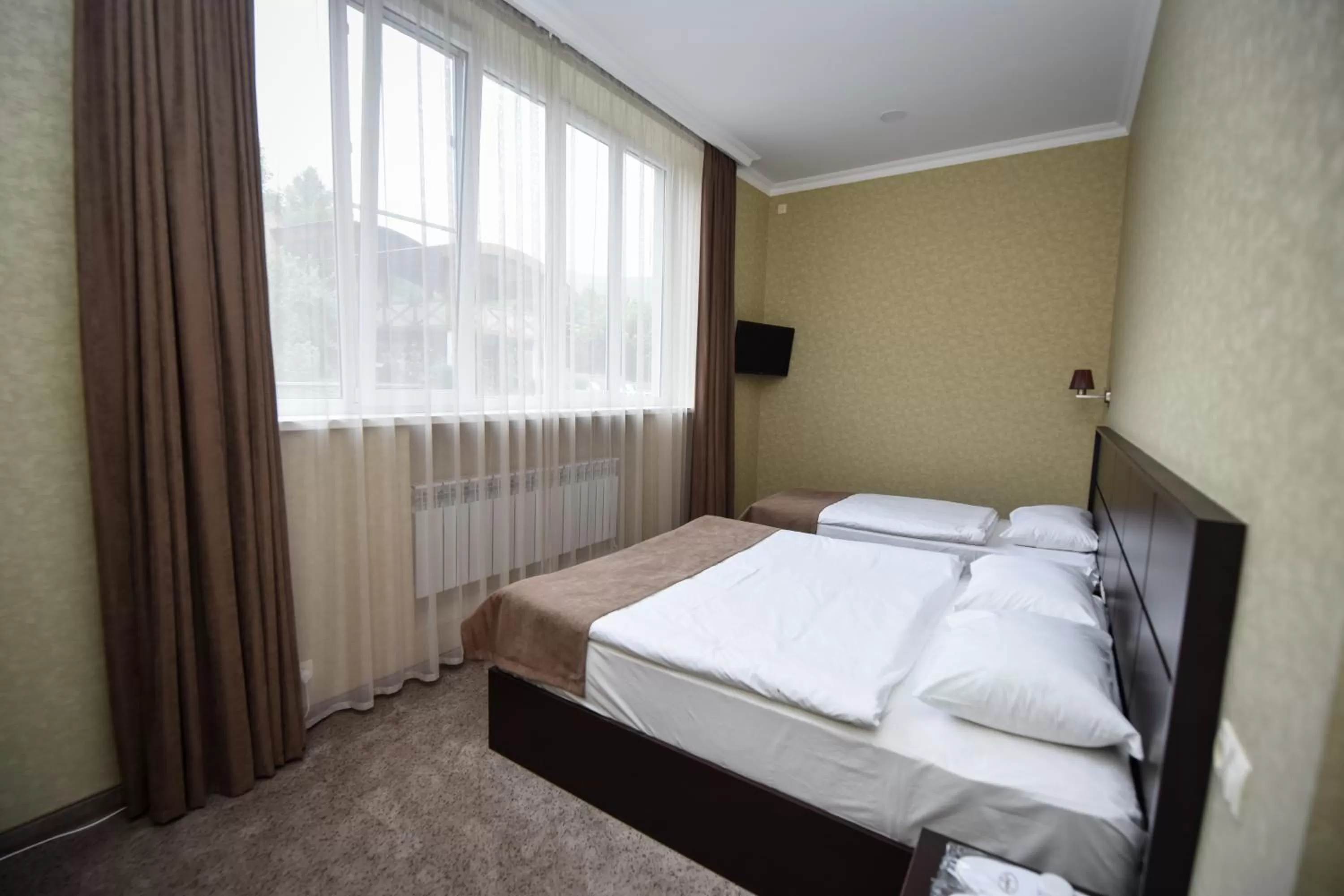 Photo of the whole room, Bed in Laguna Hotel