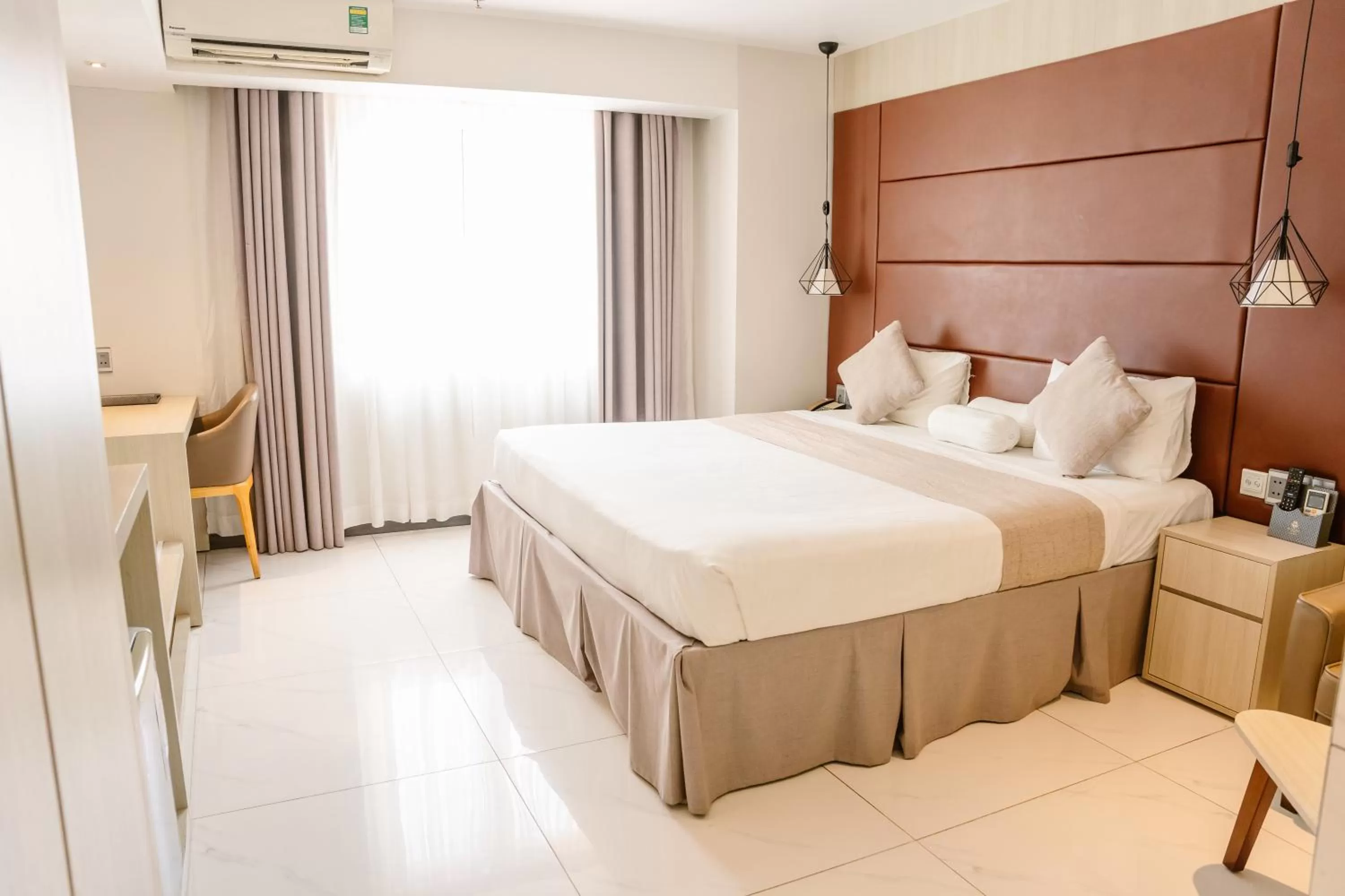 Bed in Holiday One Can Tho Hotel