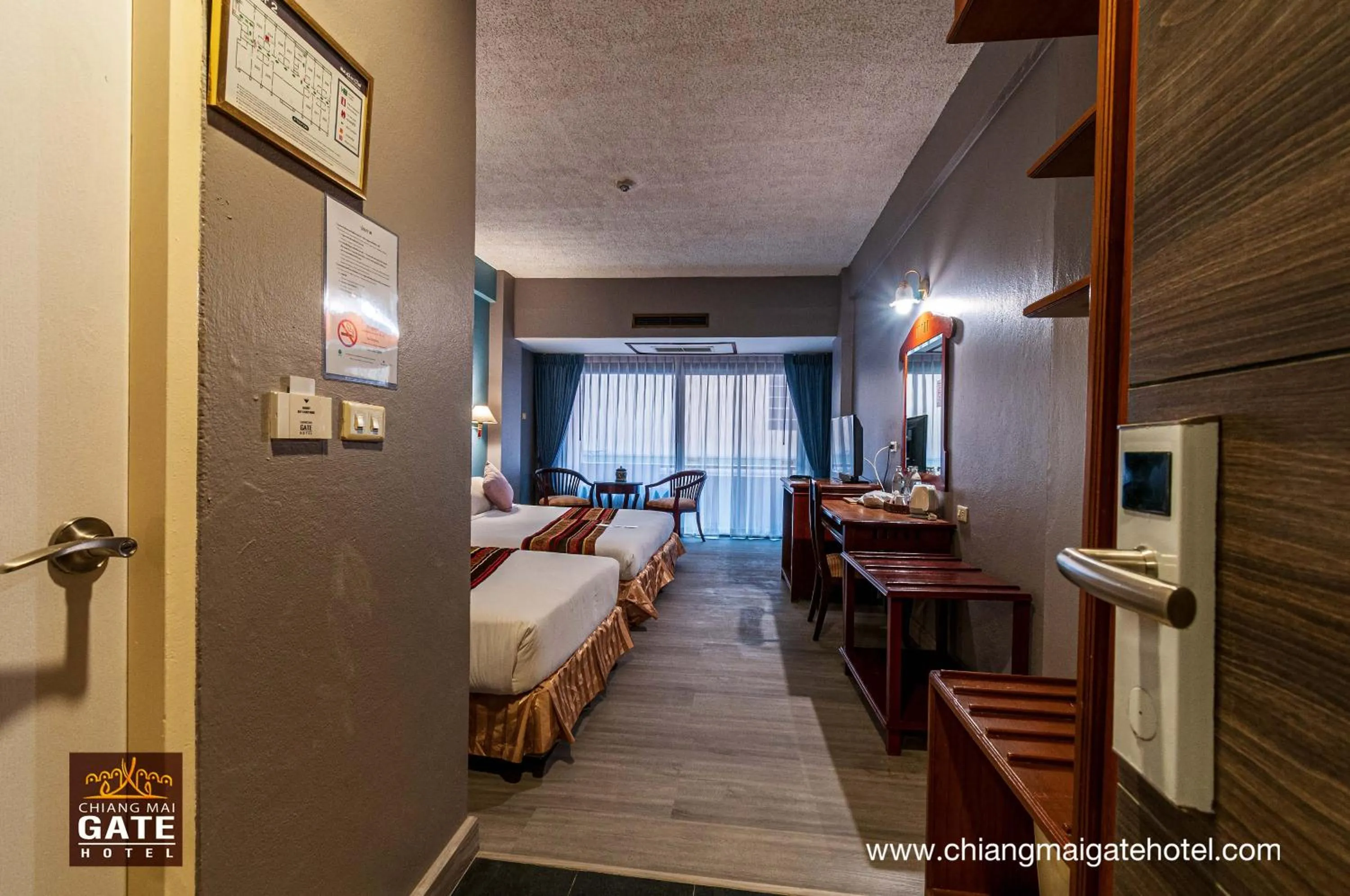 Bed in Chiangmai Gate Hotel