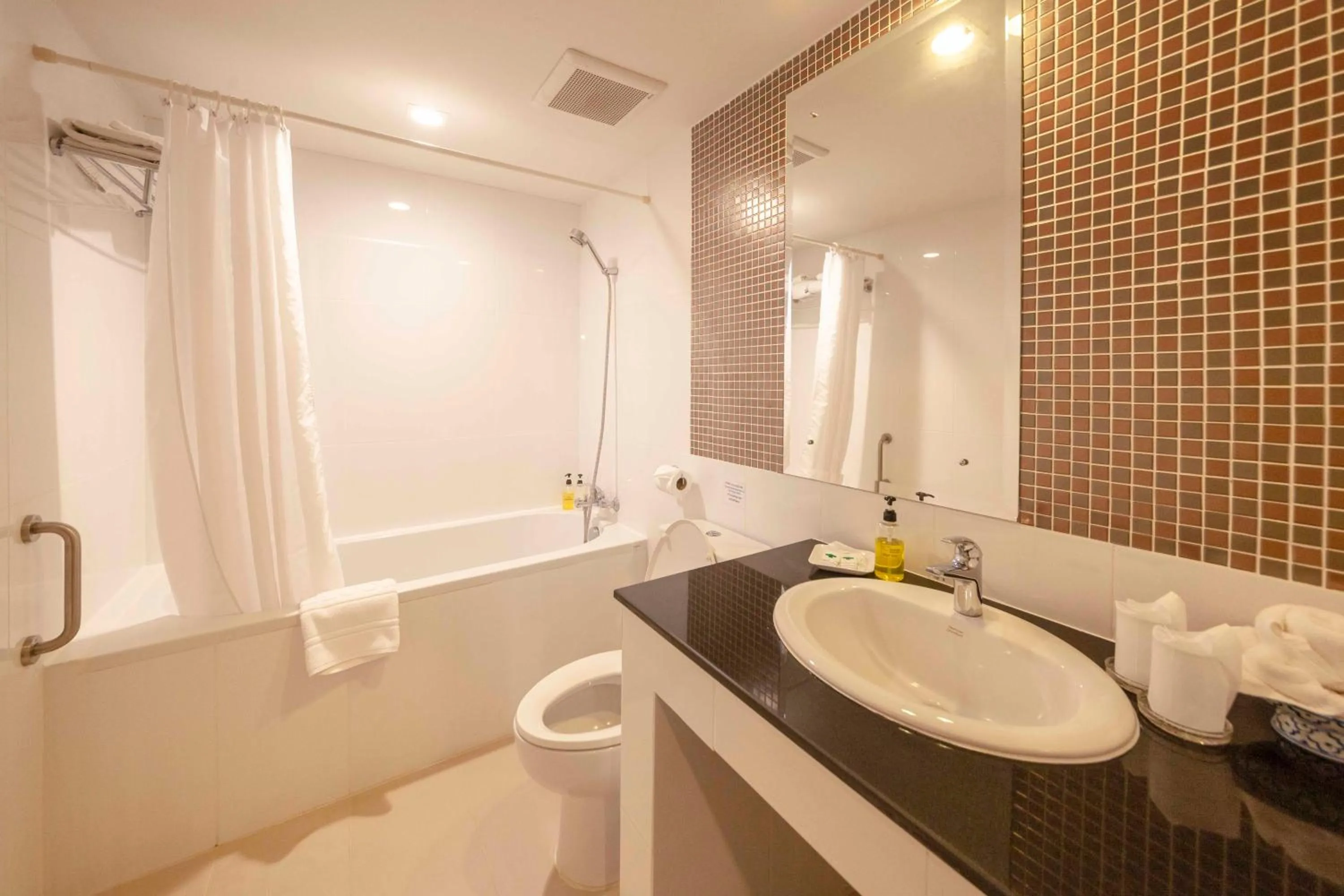 Bathroom in Holiday Garden Hotel & Resort SHA EXTRA PLUS