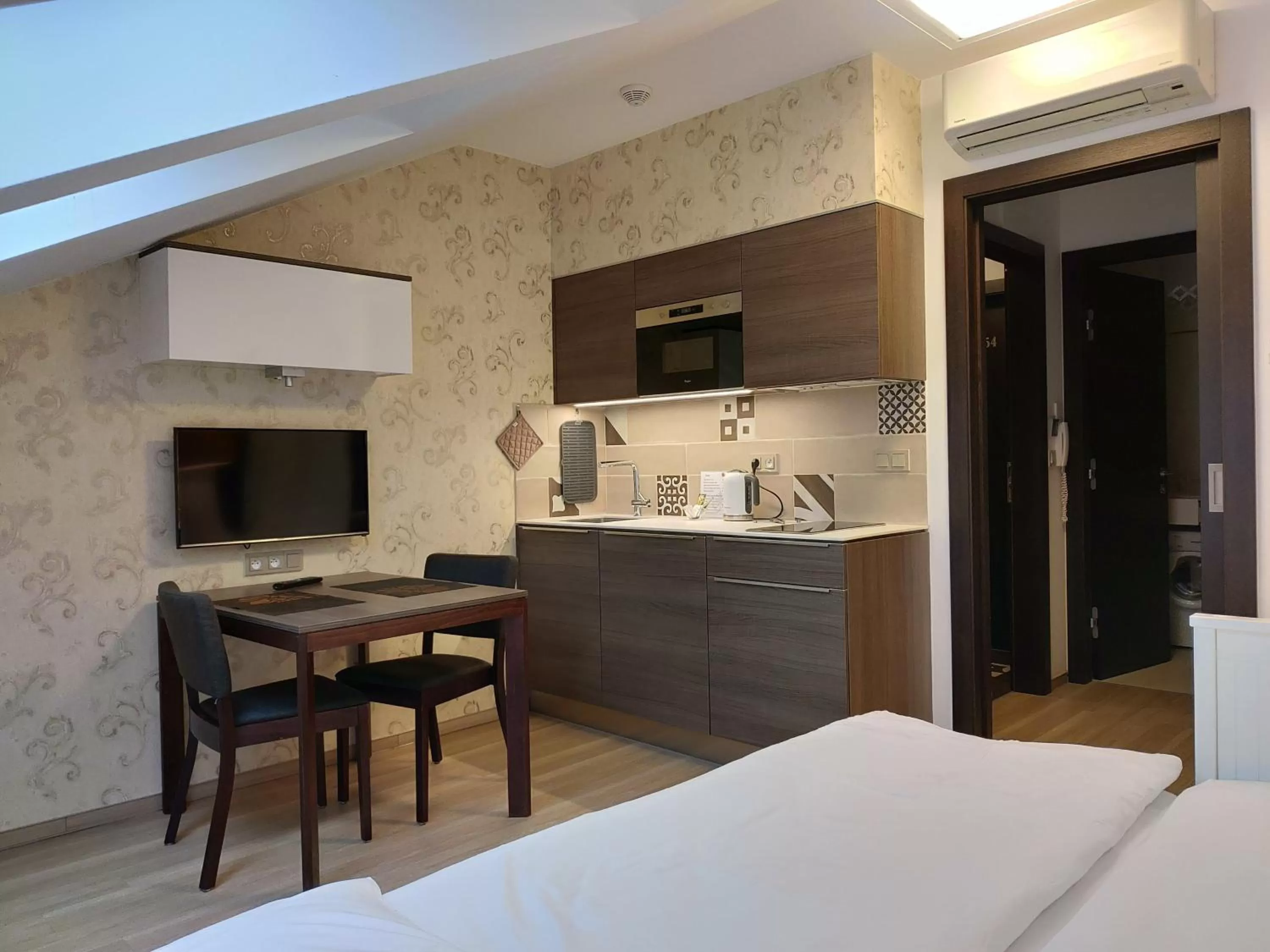 kitchen, Bed in VINOHRADSKY DUM Residence