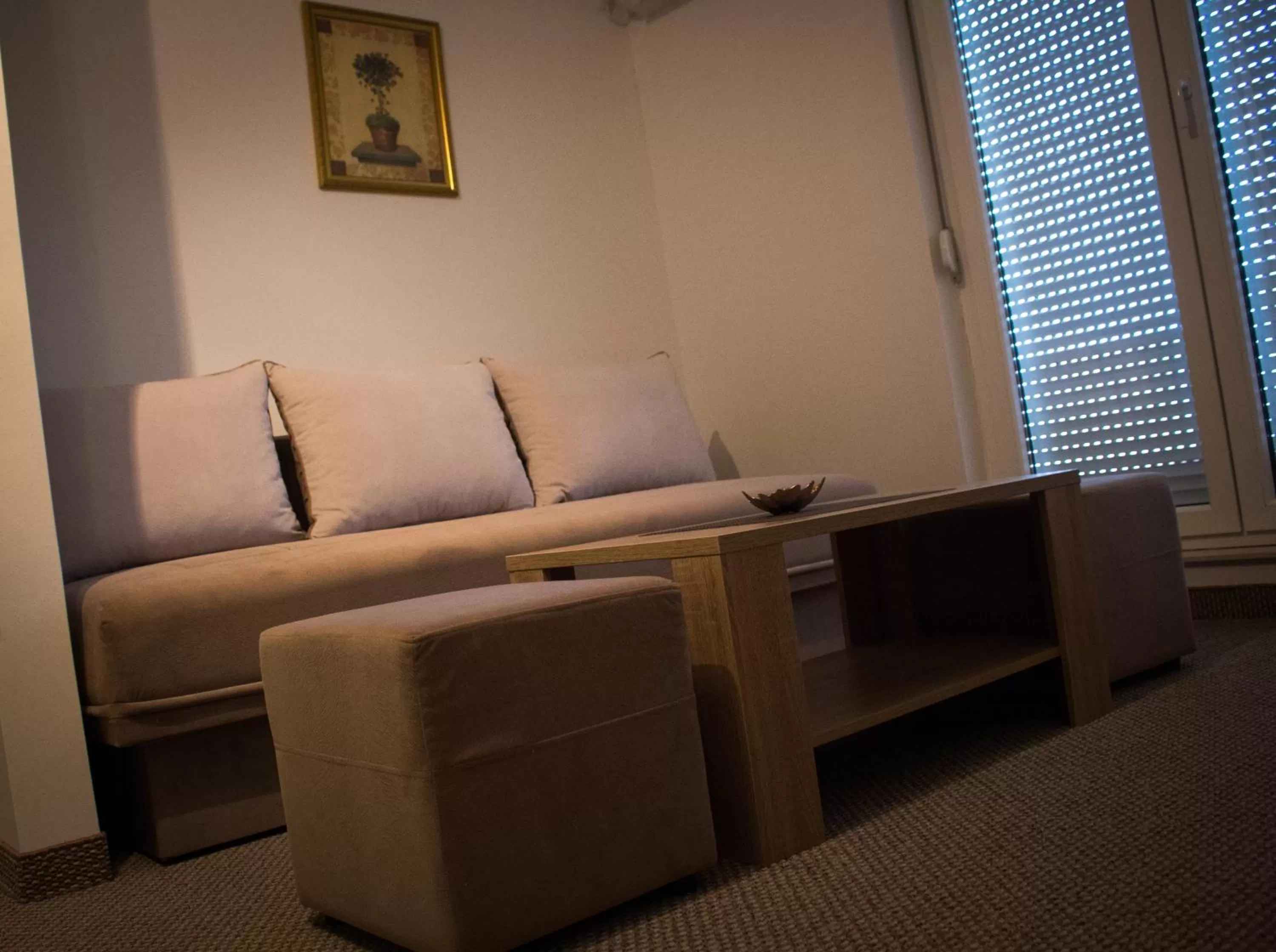 Bedroom, Seating Area in Motel Aura