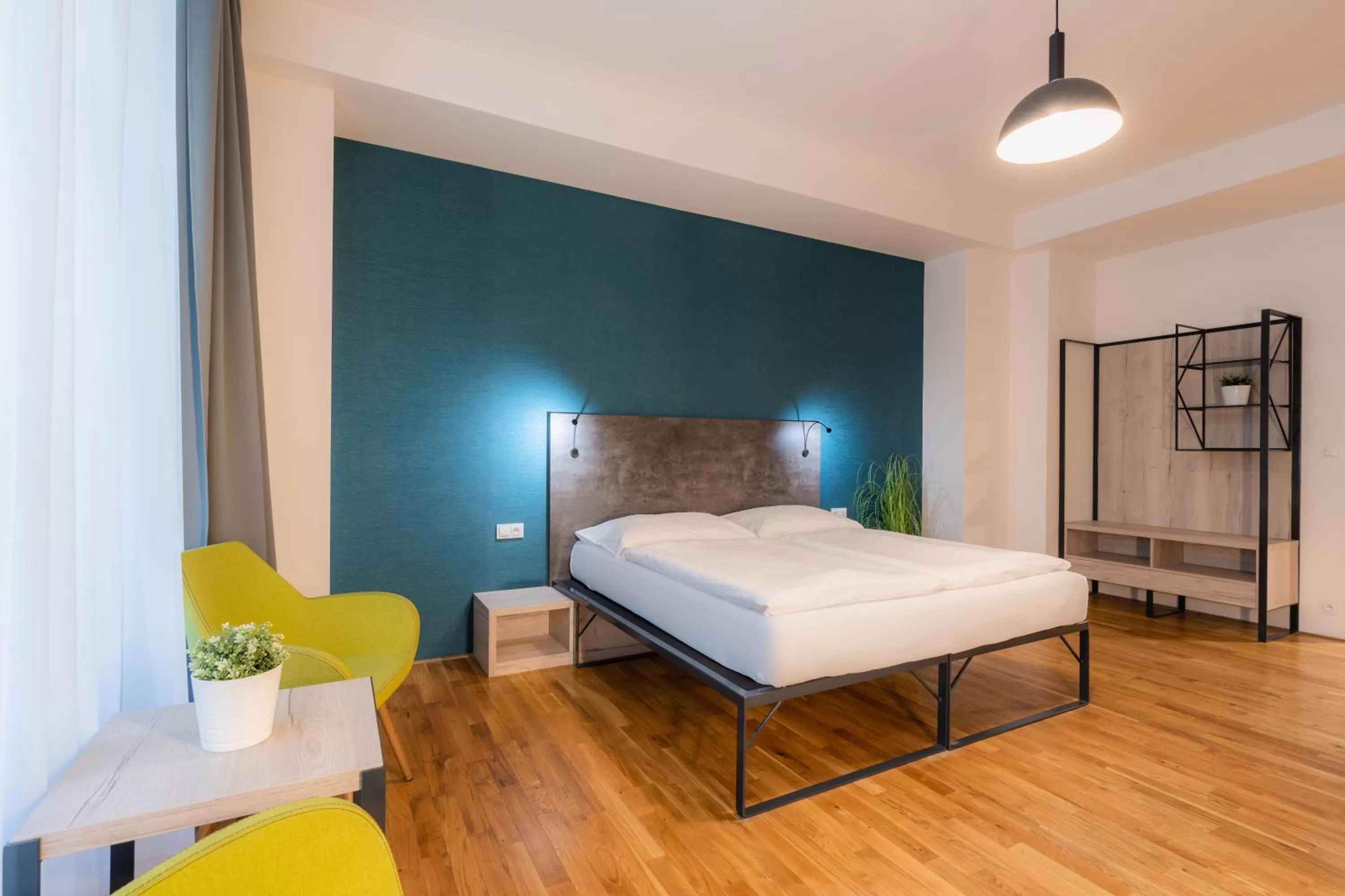 Bed in EA ApartHotel Melantrich