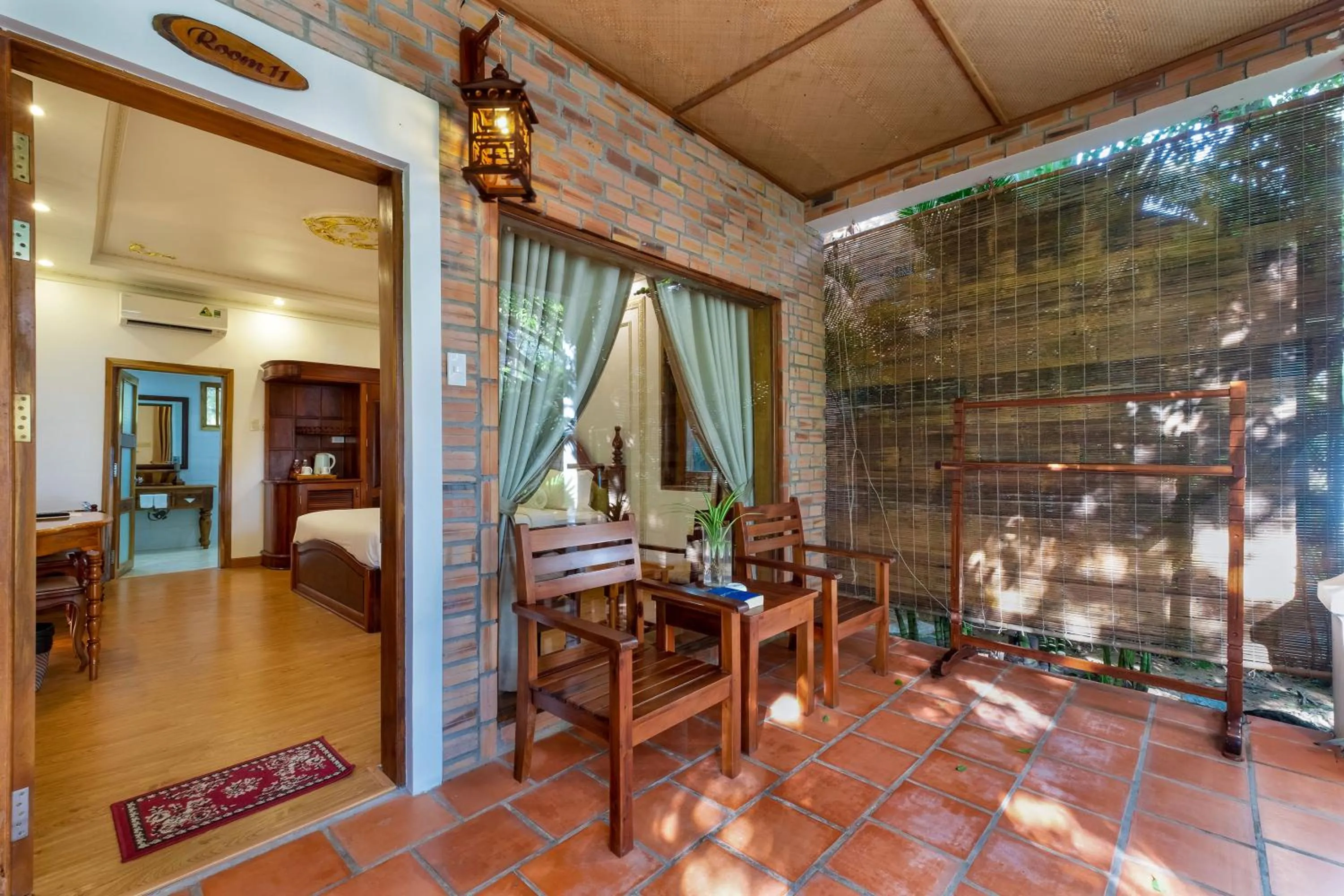 Balcony/Terrace, Bed in Coco Palm Beach Resort