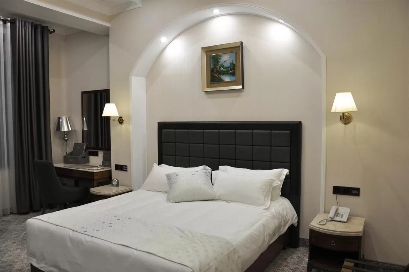 Bed in Parliament Palace Hotel