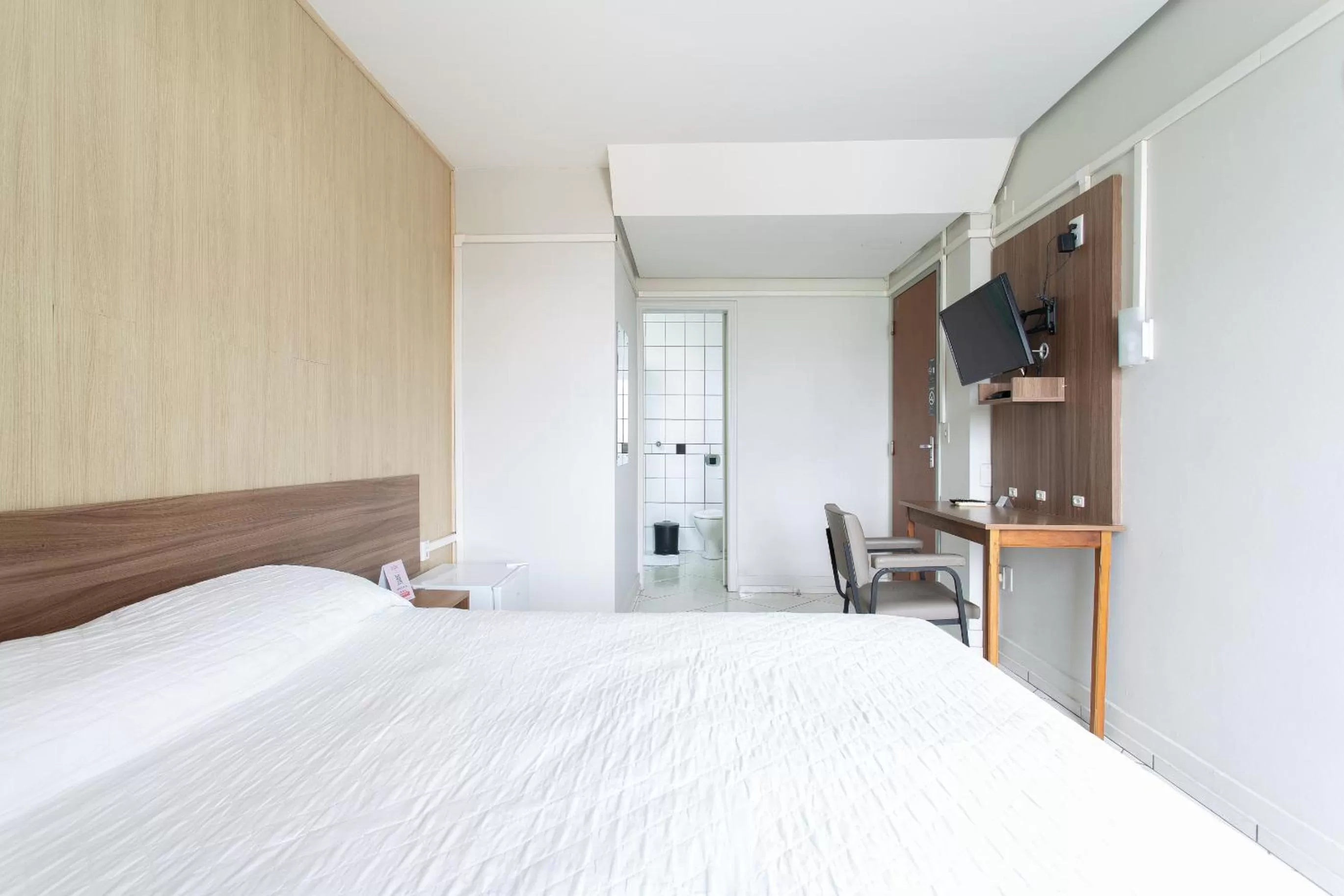 Bed in Hotel Dom Rafael Express