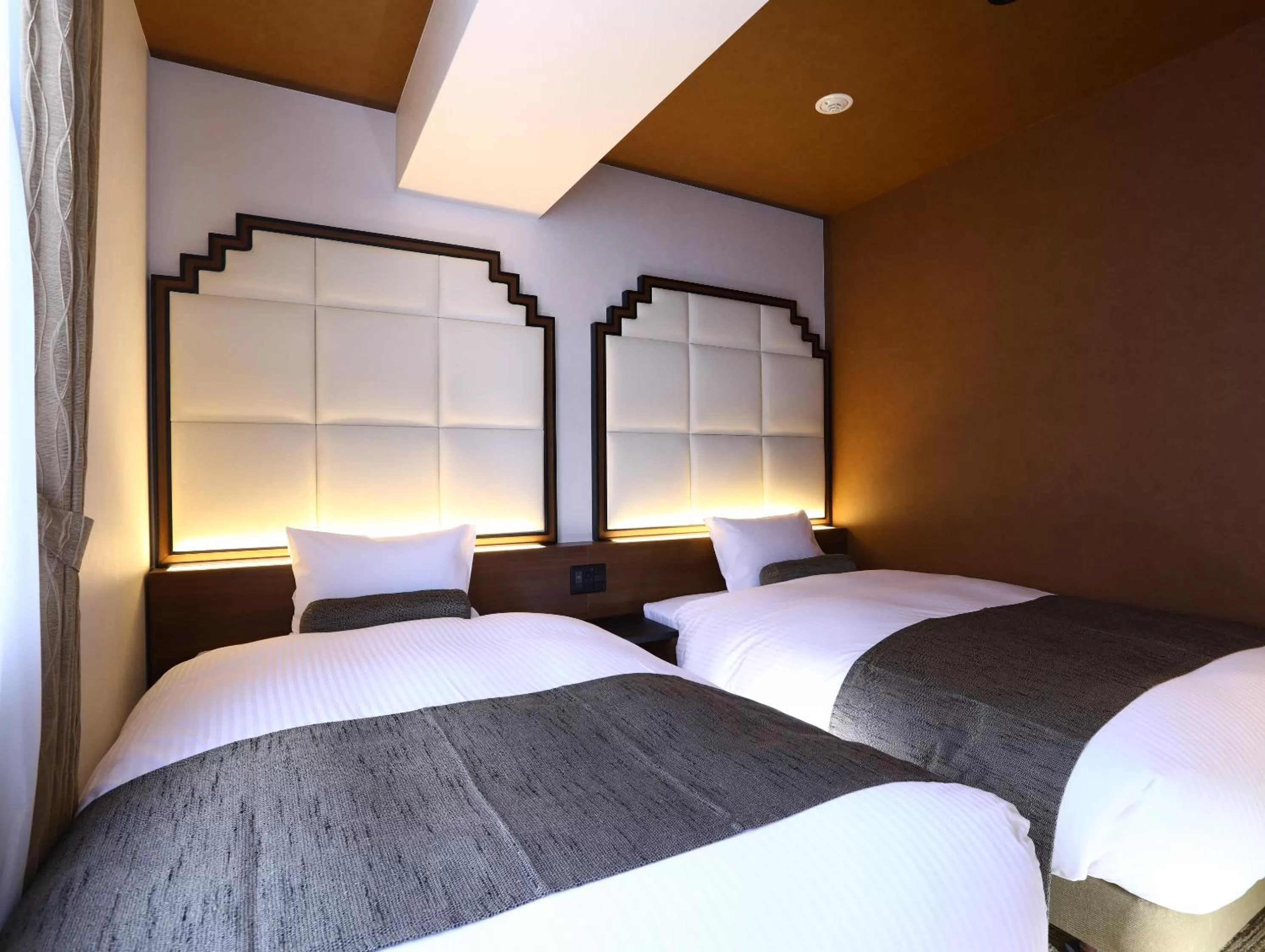 Bed in Hotel Wing International Select Osaka Umeda