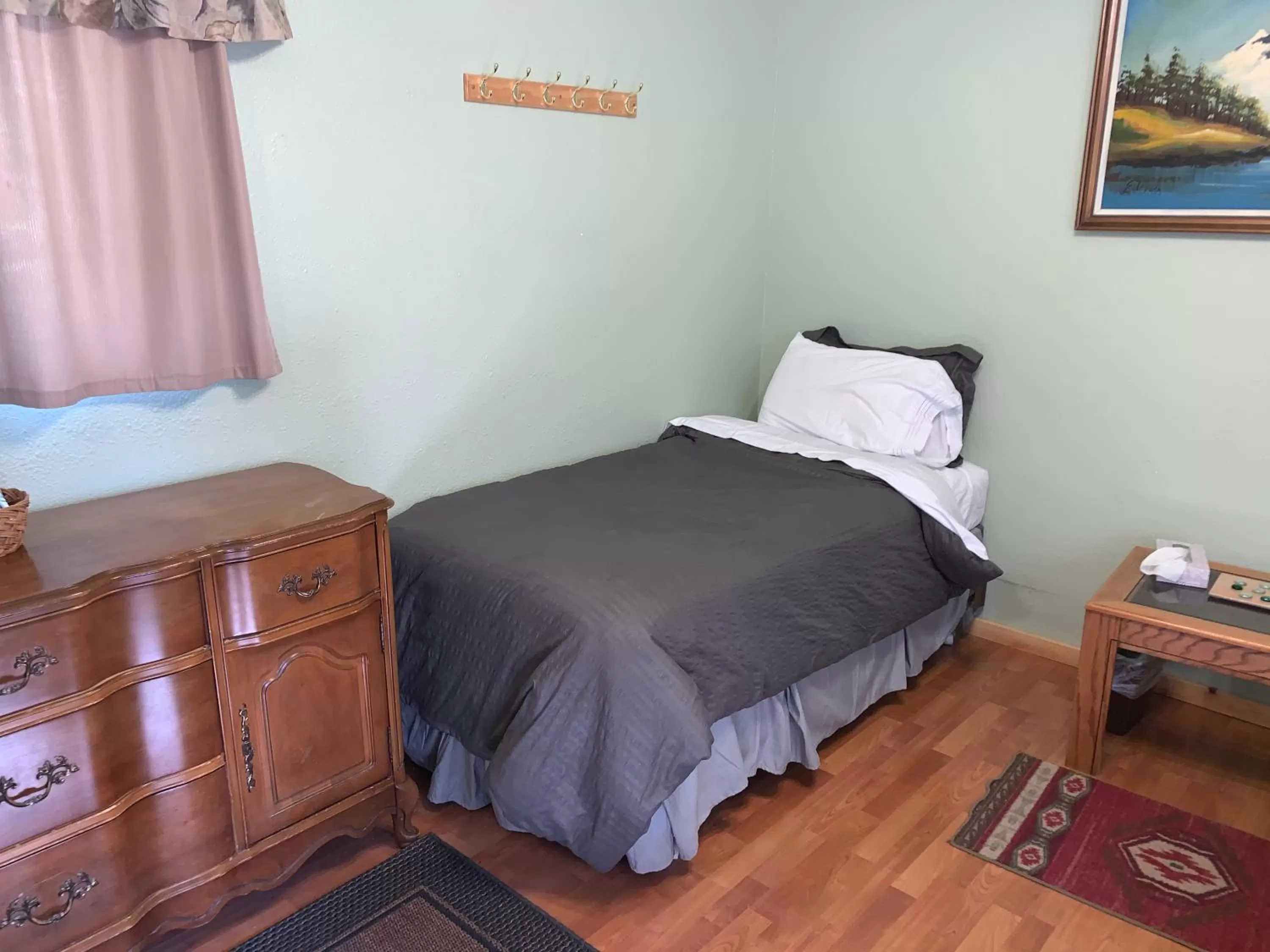 Bed in Glacier Haven Inn