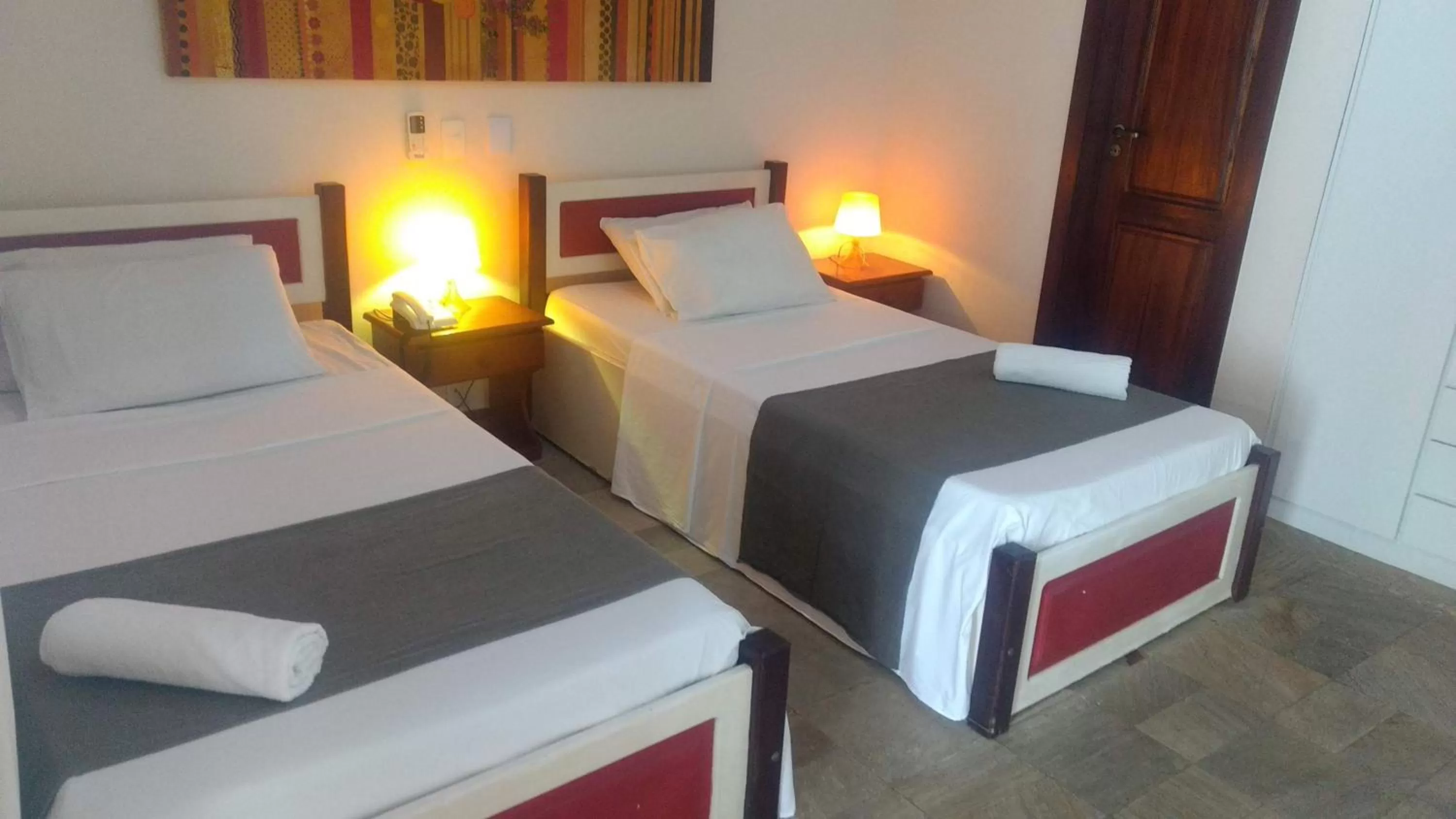 Bed in Hotel Pousada Salvador Paradise