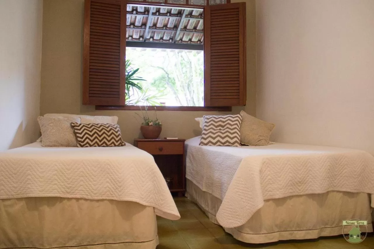 Bed in Pousada Nossa Terra
