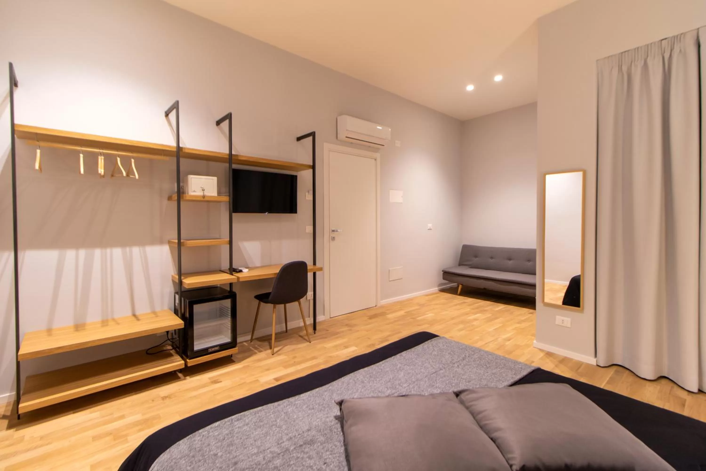 Living room, Bed in Terrazza Sangiuliano