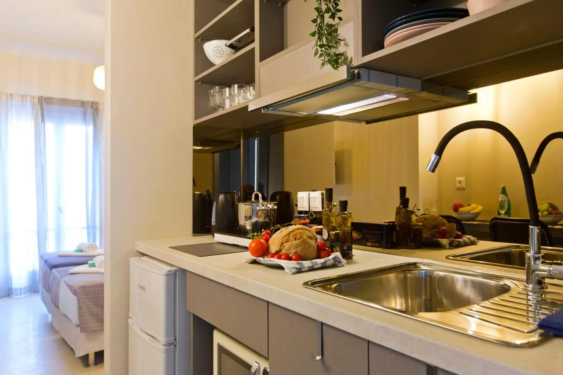 Kitchen or kitchenette in LOC HOSPITALITY Urban Suites