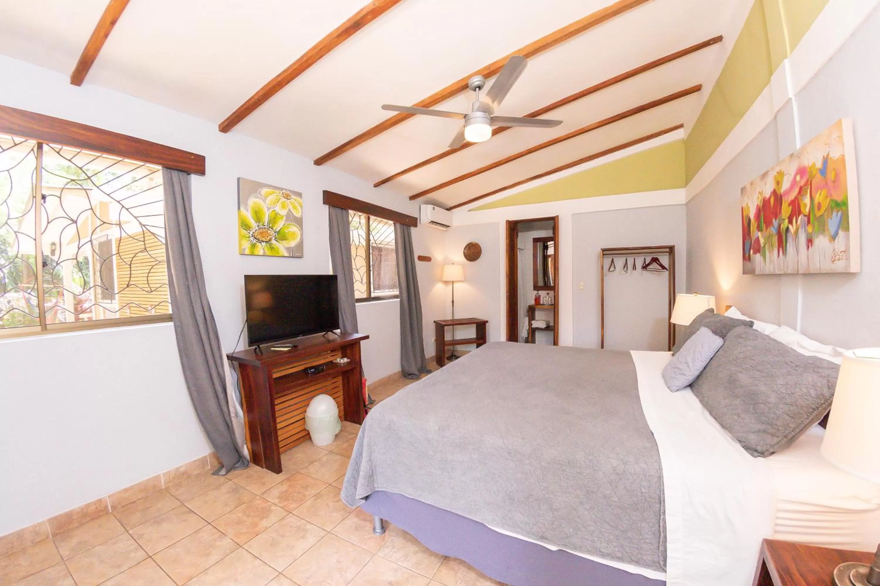 Bed, TV/Entertainment Center in Xalli Beach Hotel