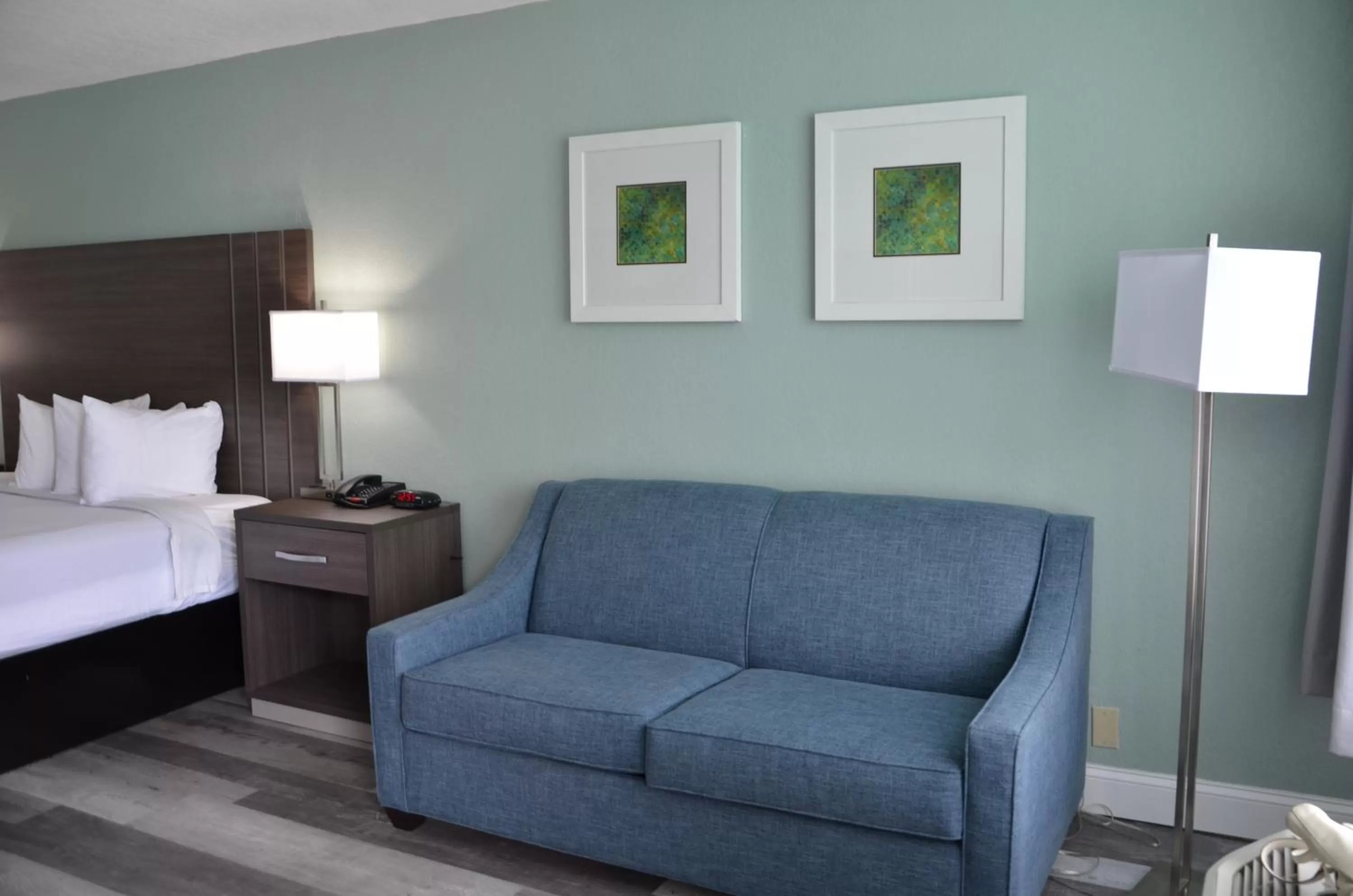 Bed in Opal Hotel & Suites