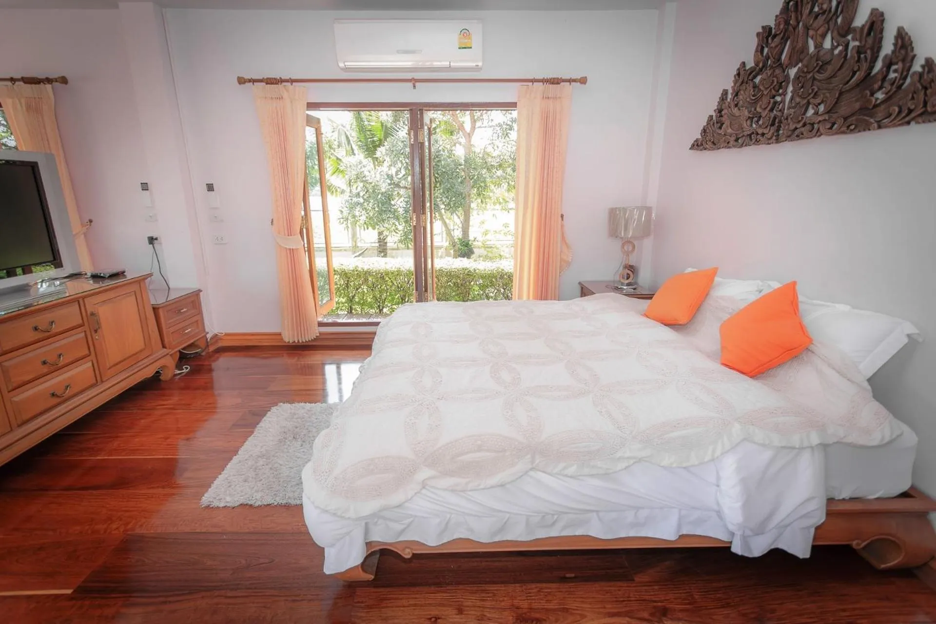 Bed in Thararin Villa