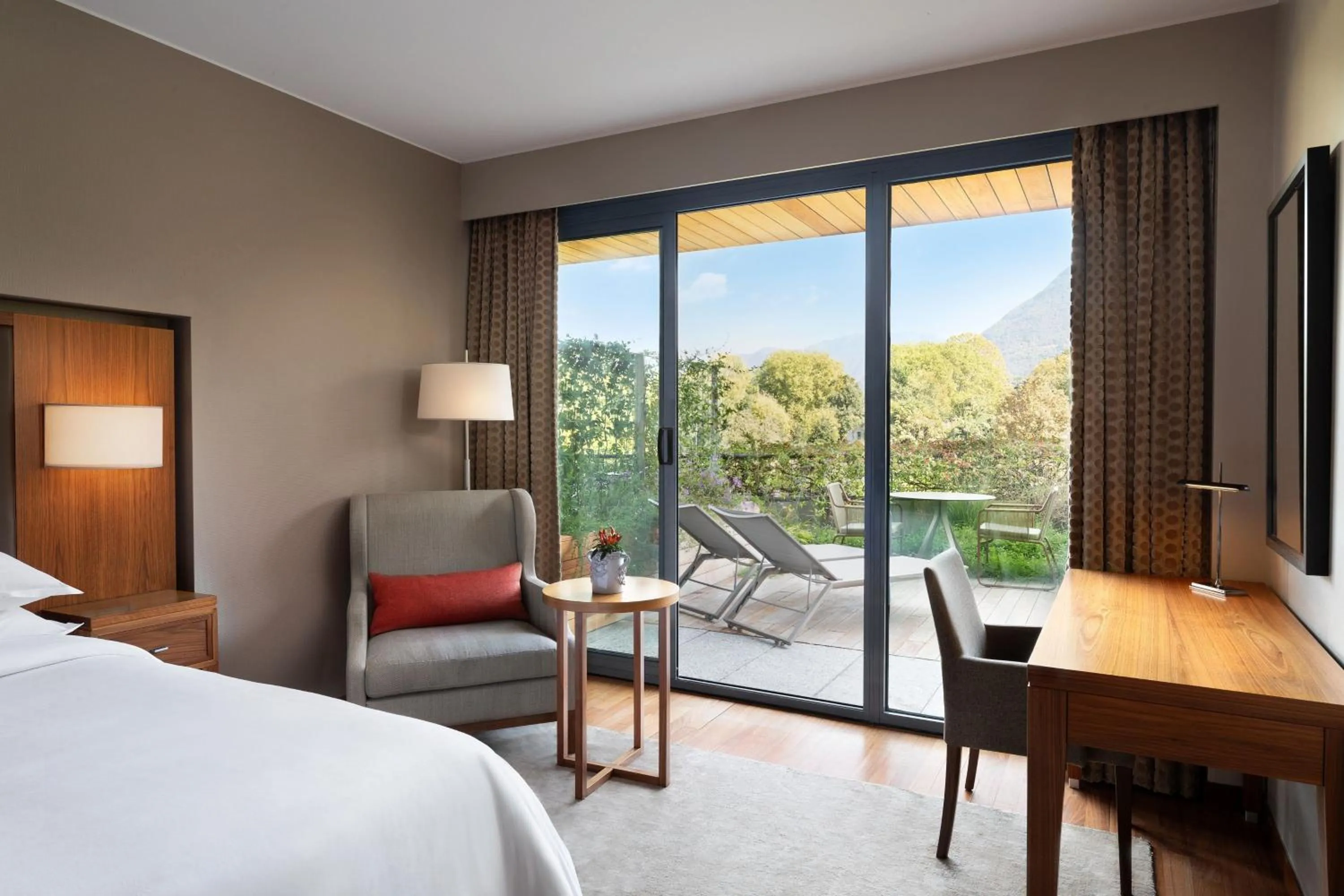 Photo of the whole room, Bed in Sheraton Lake Como Hotel