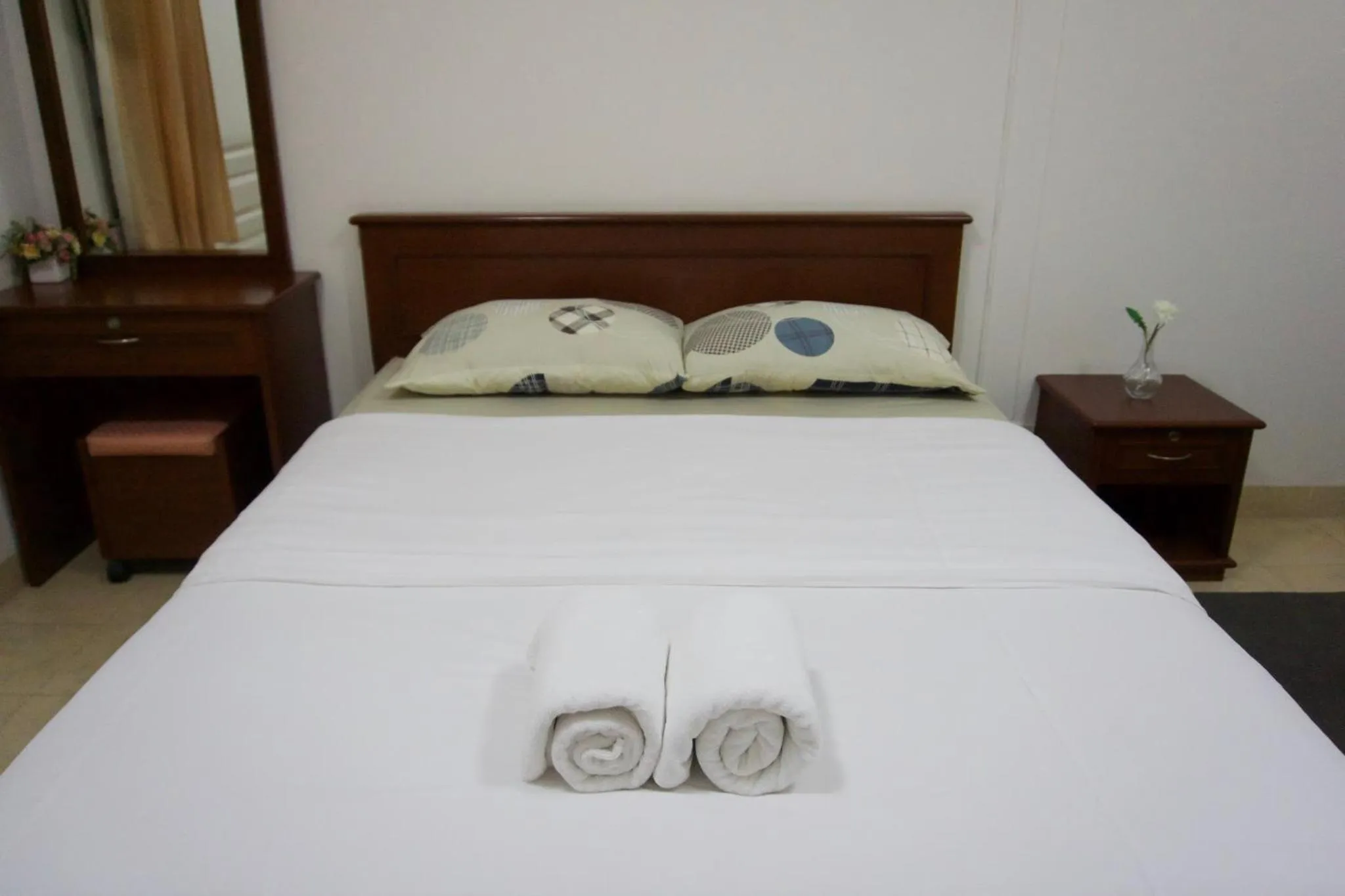 Bed in Baan Boonanan Apartment