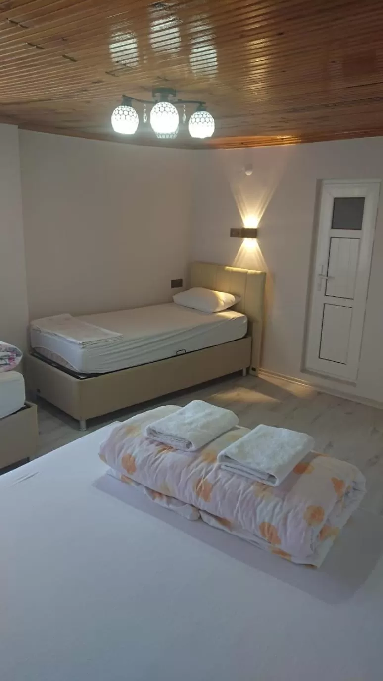 Bed in Ali's Pension