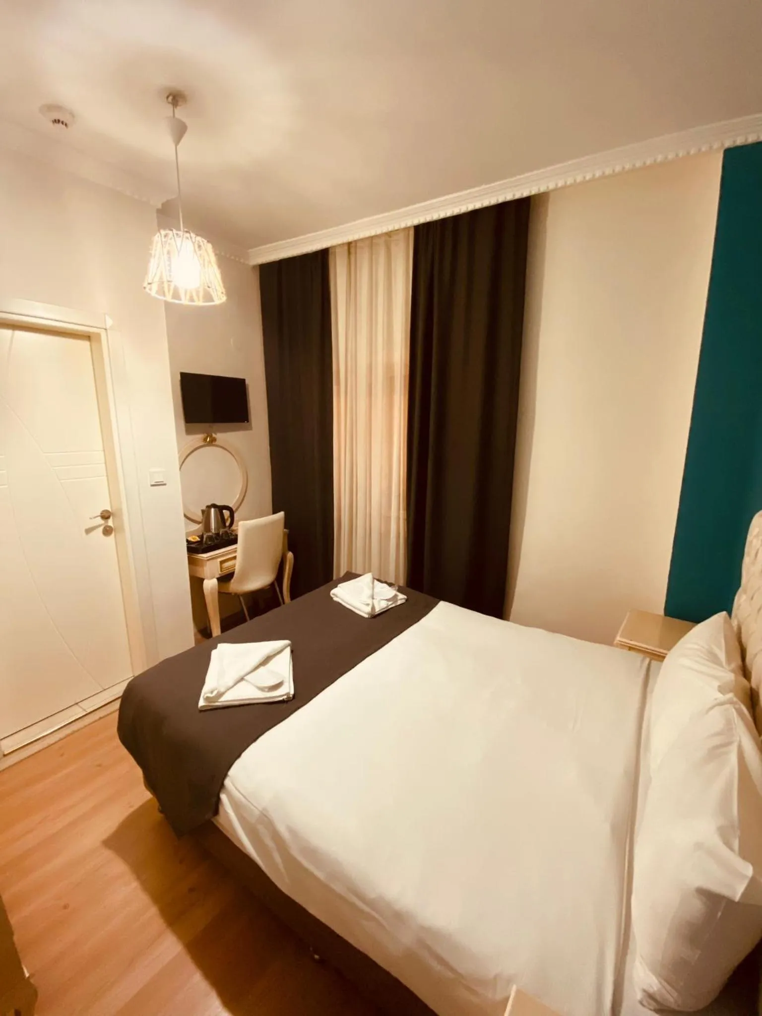 Photo of the whole room, Bed in Adora Hotel